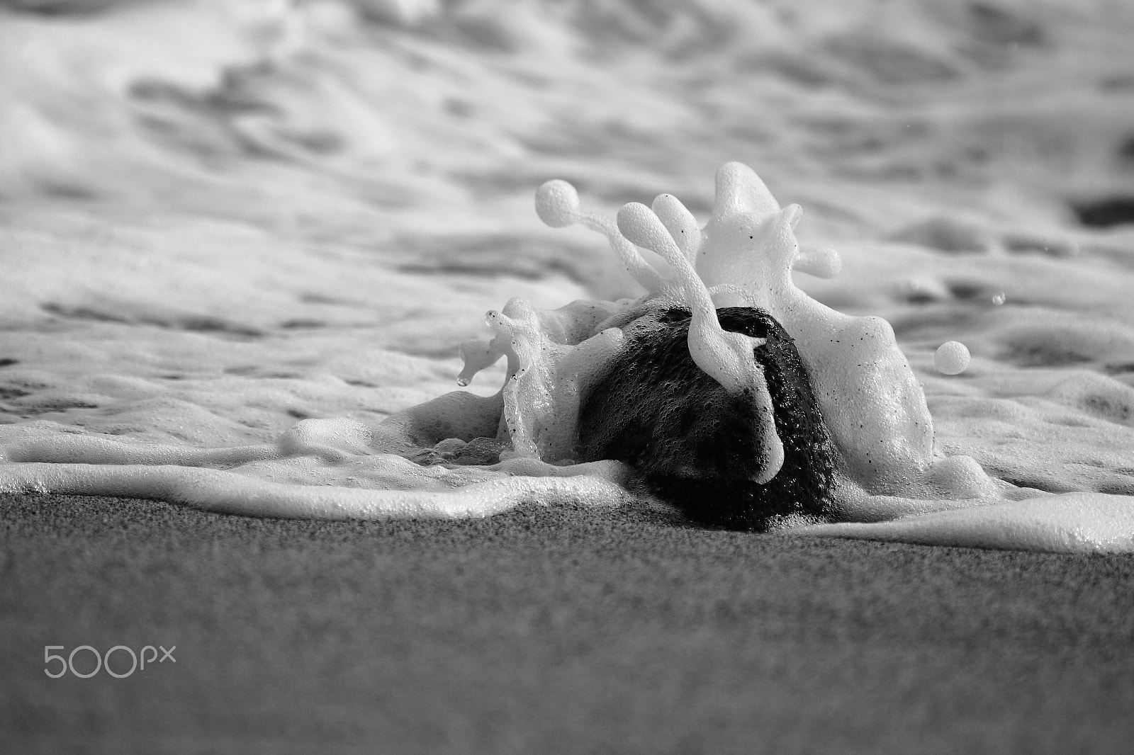 Canon EF 100-400mm F4.5-5.6L IS USM sample photo. Wave on rock b&w photography