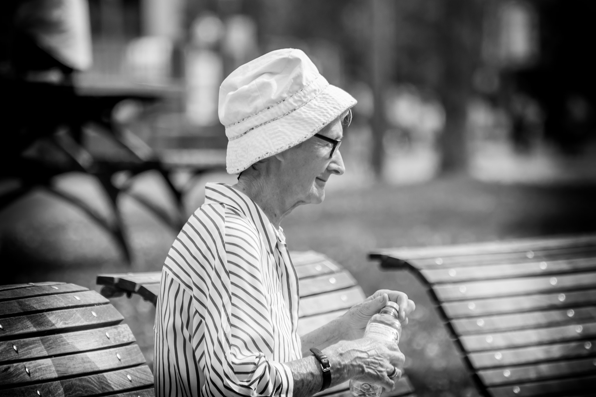 Canon EOS 7D Mark II + EF75-300mm f/4-5.6 sample photo. Lady in the park photography