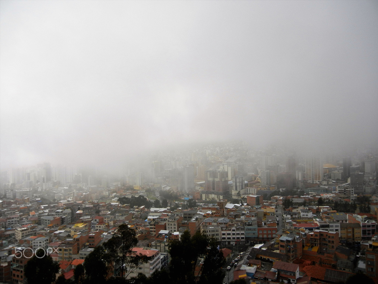 Nikon Coolpix S8100 sample photo. La paz in clouds photography