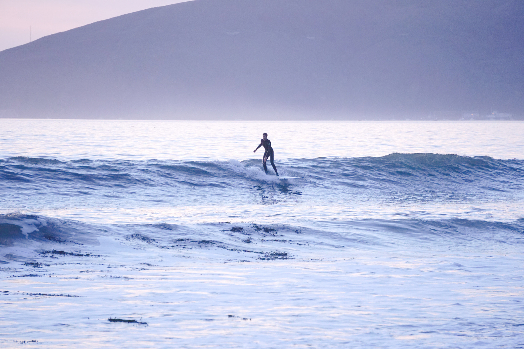 Sony a6300 + Sony E 55-210mm F4.5-6.3 OSS sample photo. Surfing in solitude photography