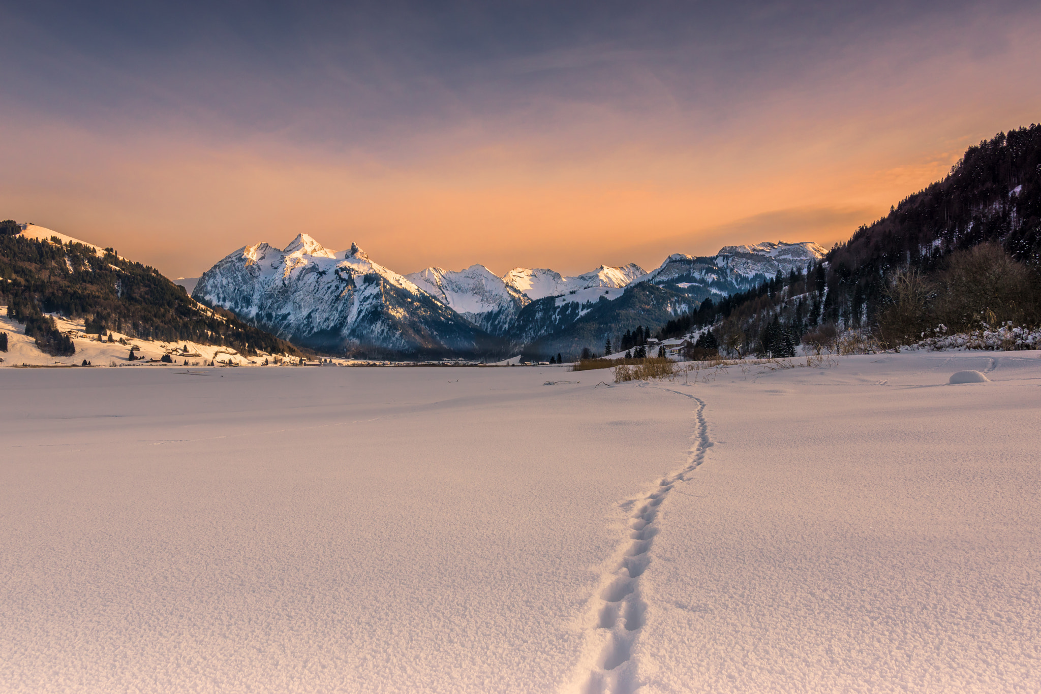 Sony ILCA-77M2 + Sigma 18-35mm F1.8 DC HSM Art sample photo. Sunset behind the mountain photography