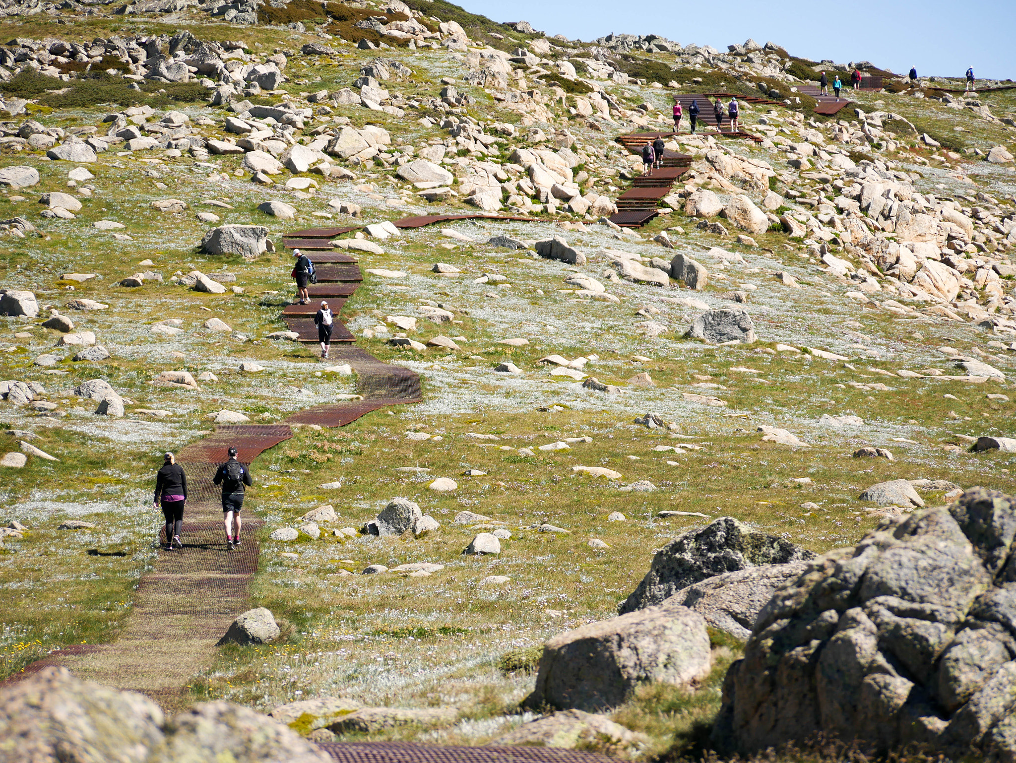Panasonic Lumix G Vario 45-200mm F4-5.6 OIS sample photo. Hiking the summit photography