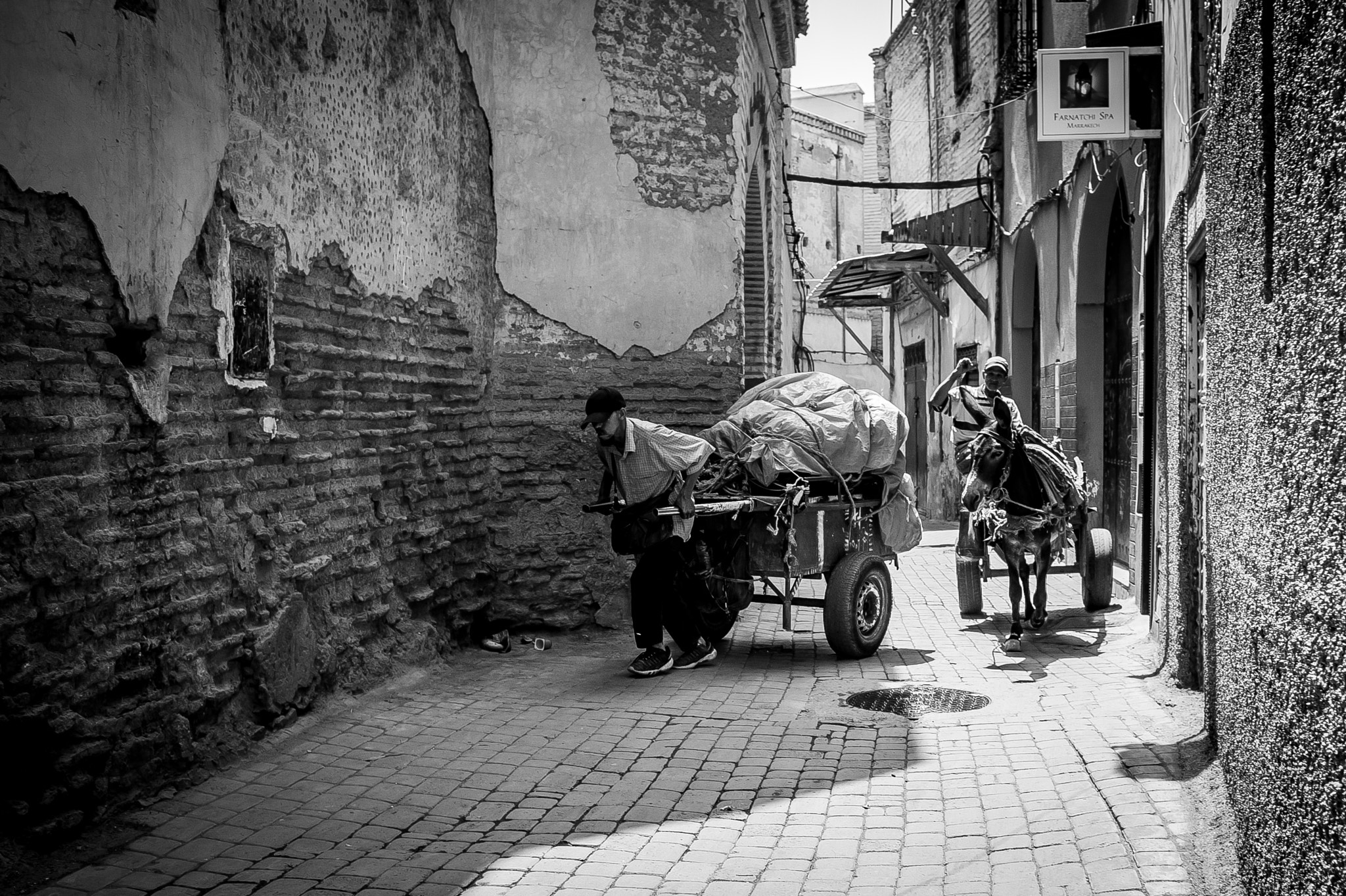 Nikon D700 + AF Nikkor 28mm f/2.8 sample photo. Tough life @ marrakech photography