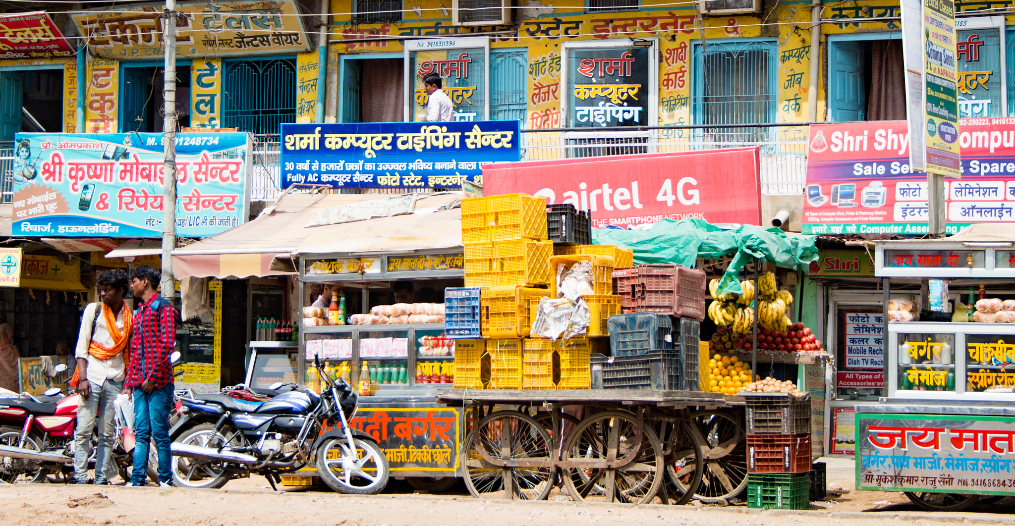 Canon EF-S 18-55mm F3.5-5.6 II sample photo. A shopping street of rewari photography