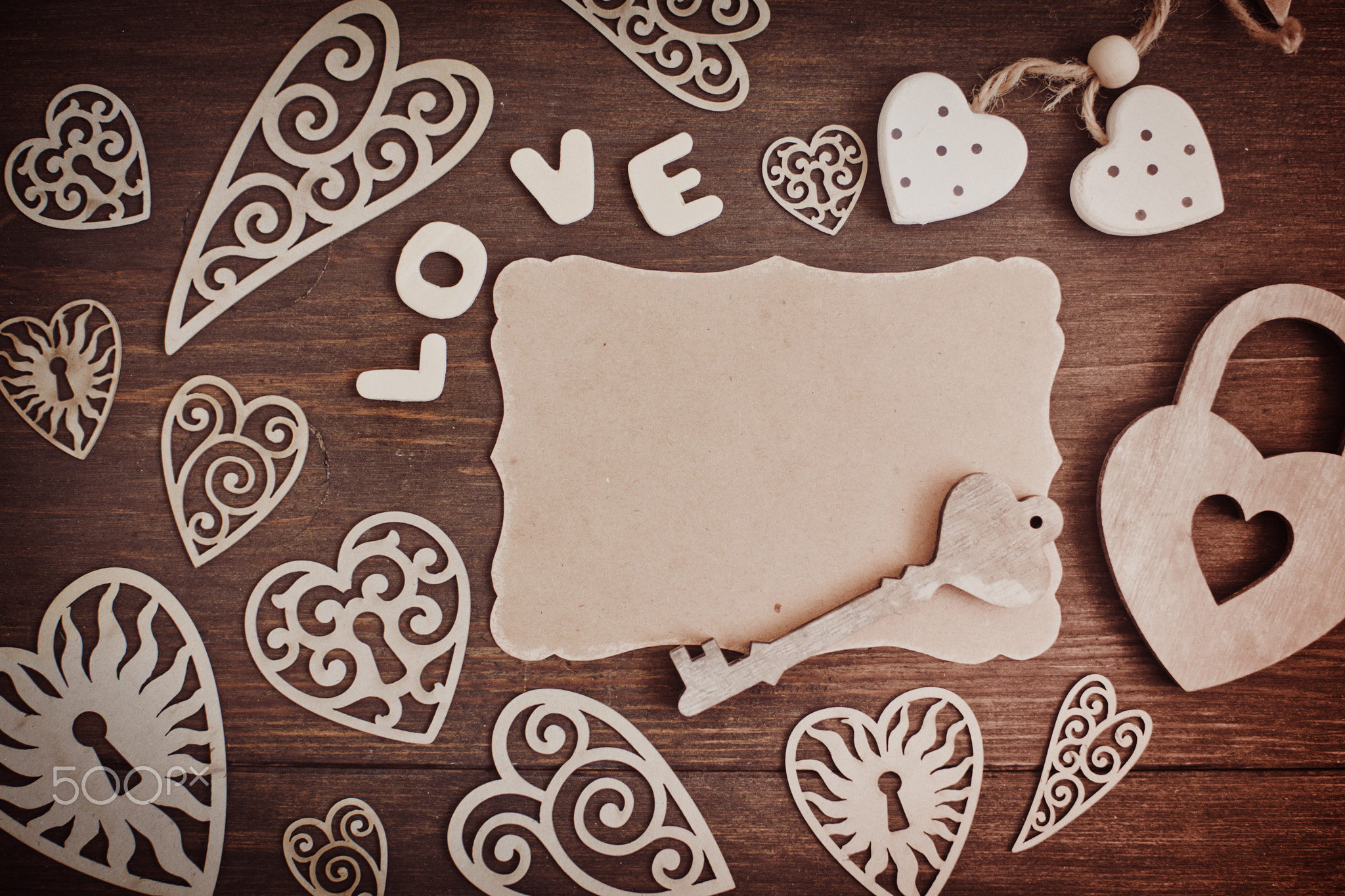 Hearts on a wooden background