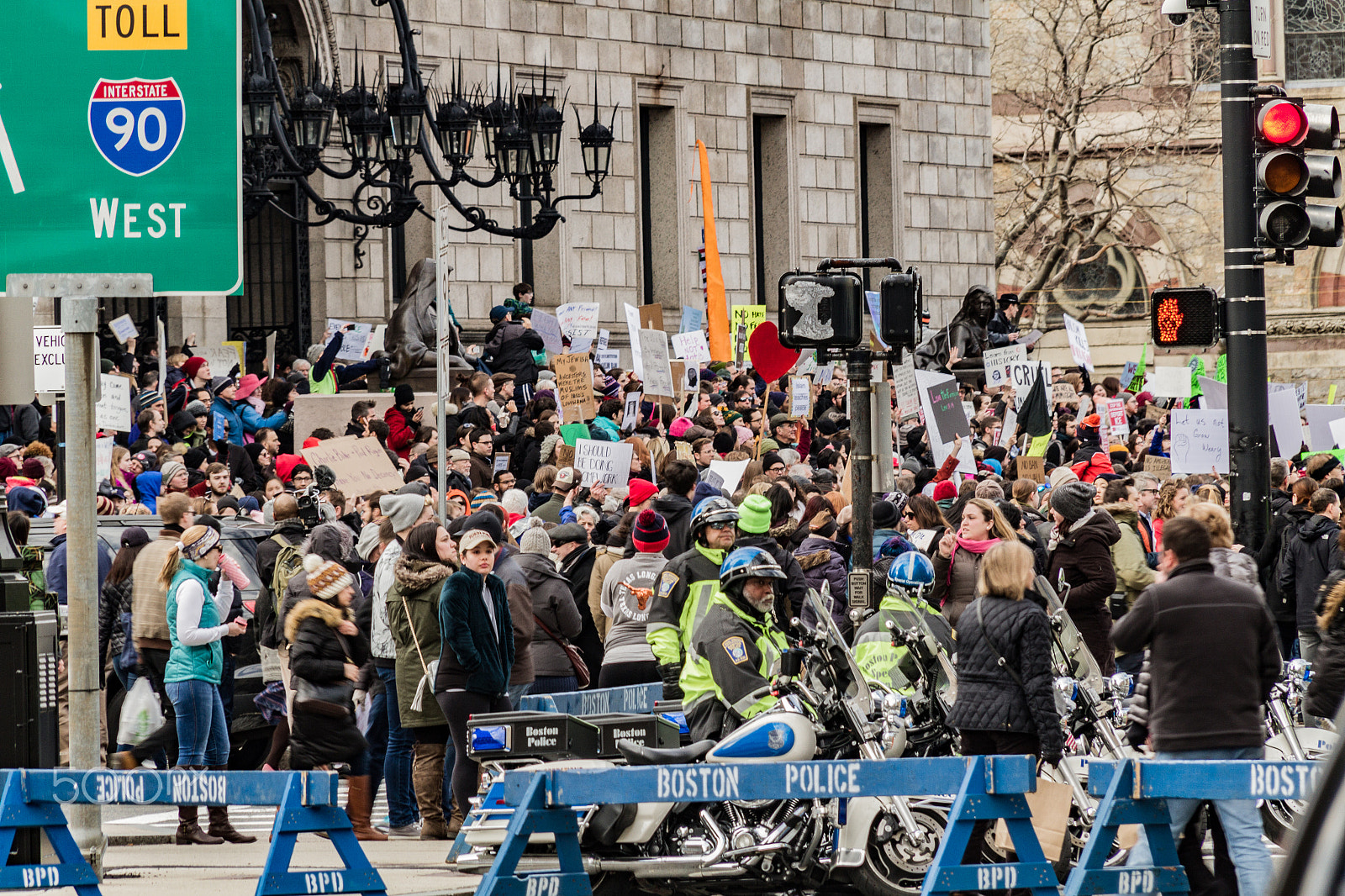 Canon EOS 7D + Sigma 18-200mm f/3.5-6.3 DC OS sample photo. Boston immigration march photography