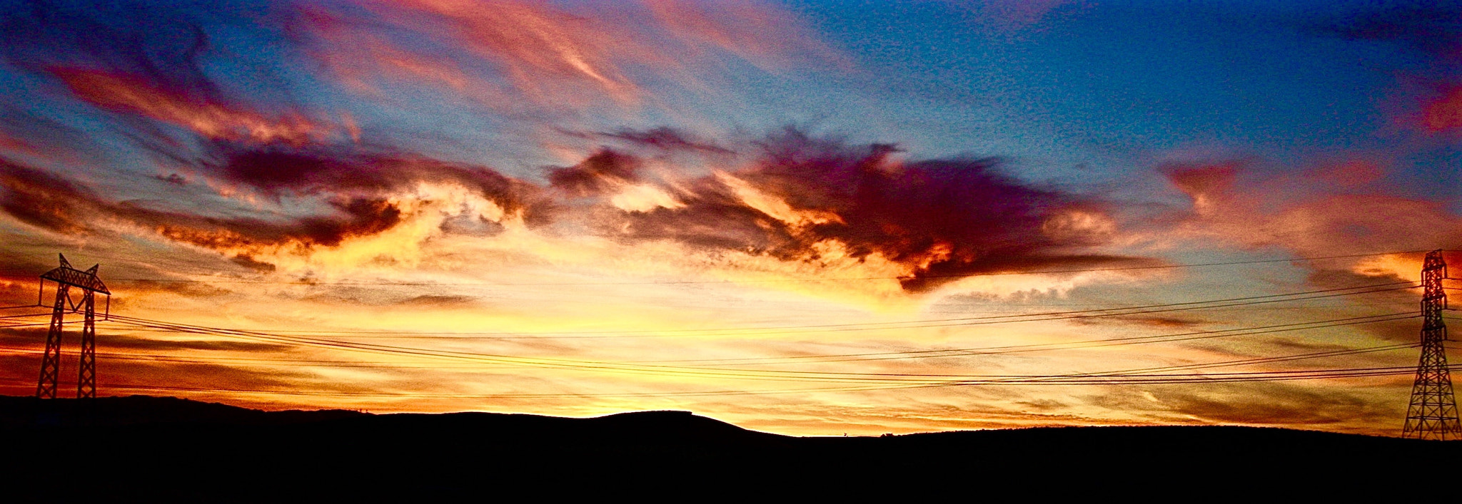 Canon EF-S 18-55mm F3.5-5.6 II sample photo. Cotton candy cloudscapes during twilight photography