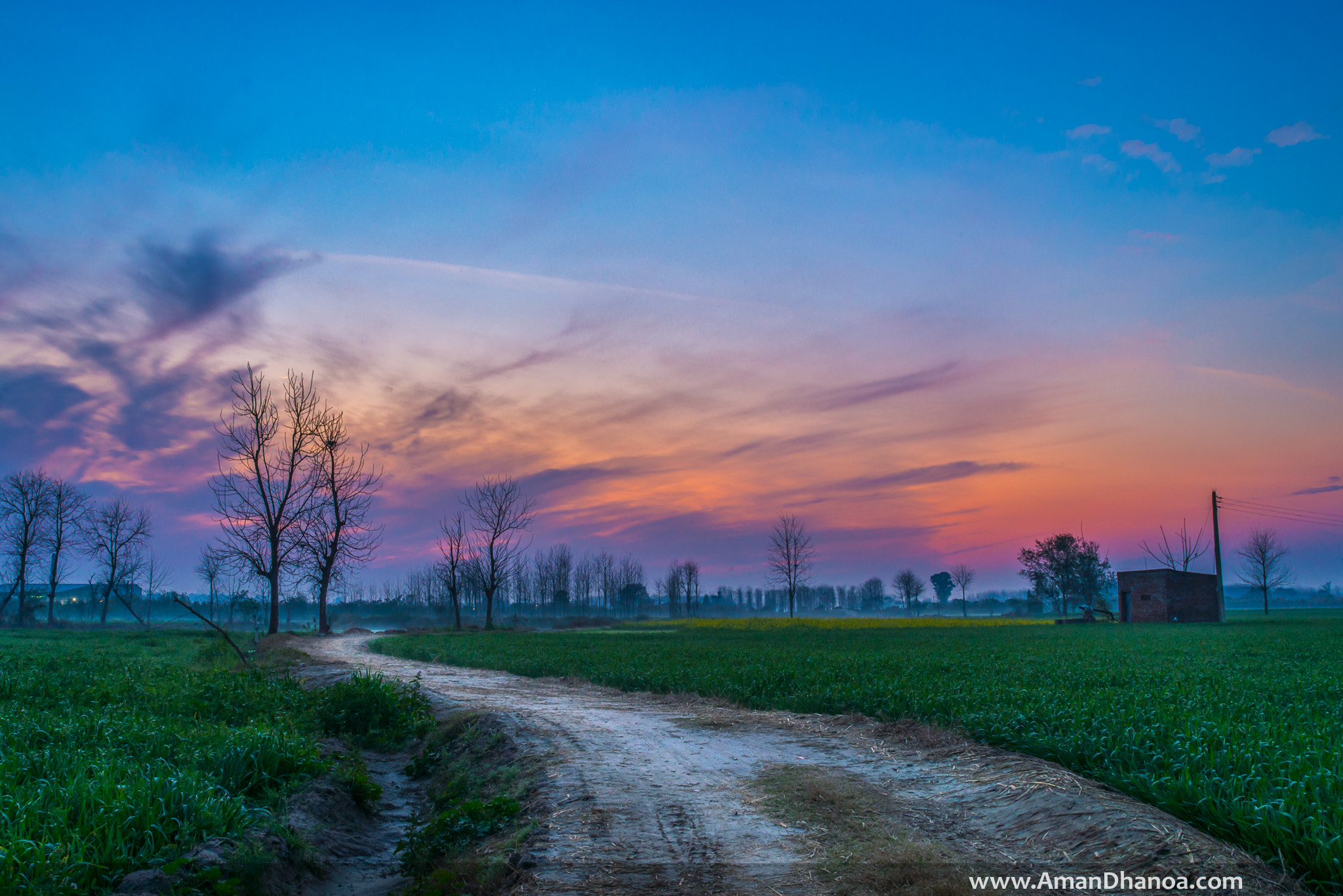 AF Zoom-Nikkor 28-80mm f/3.3-5.6G sample photo. Colourful sunset in a village photography