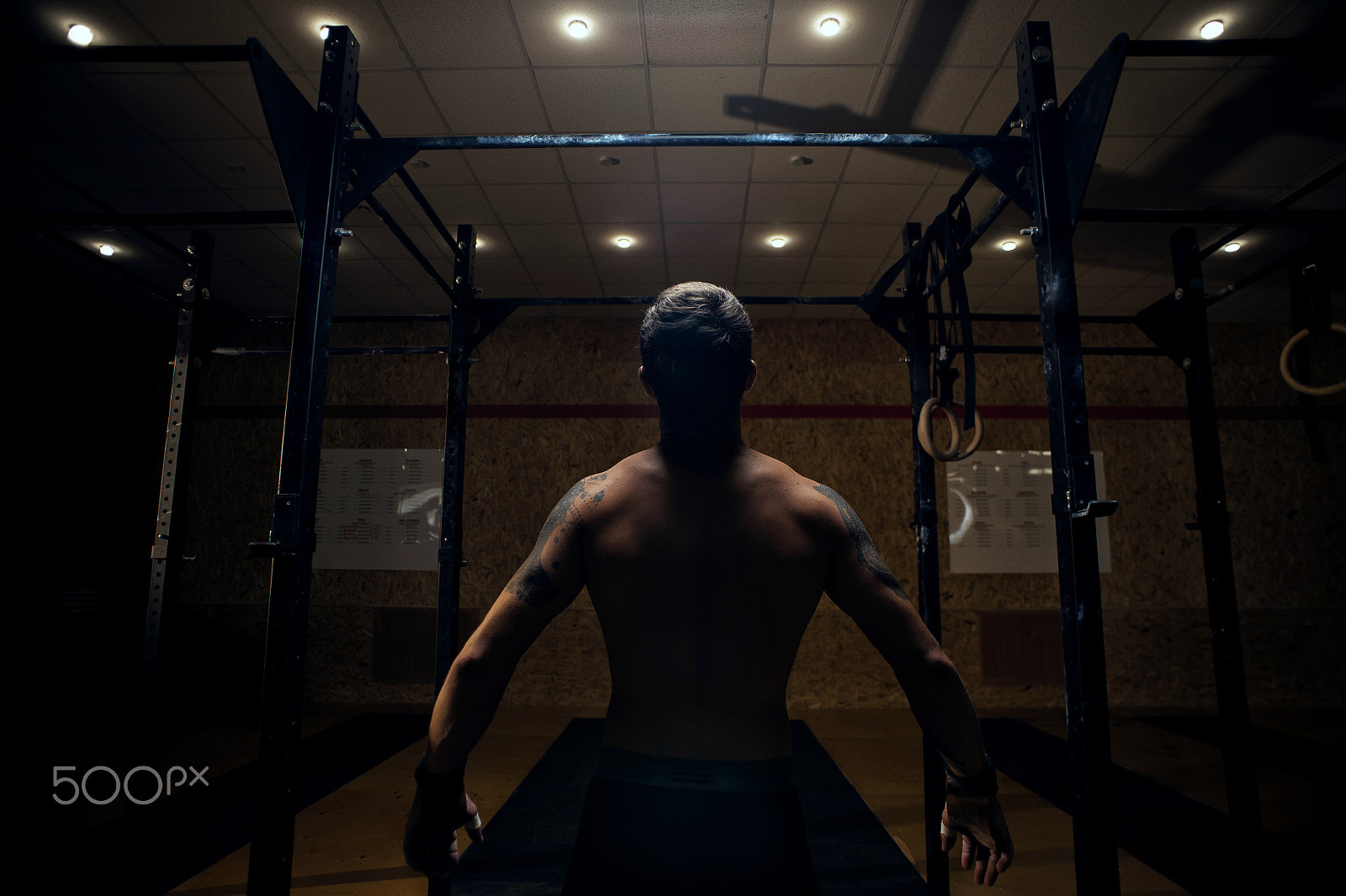 Nikon D700 + Nikon AF Nikkor 20mm F2.8D sample photo. Male muscular athlete preparing for pull up photography