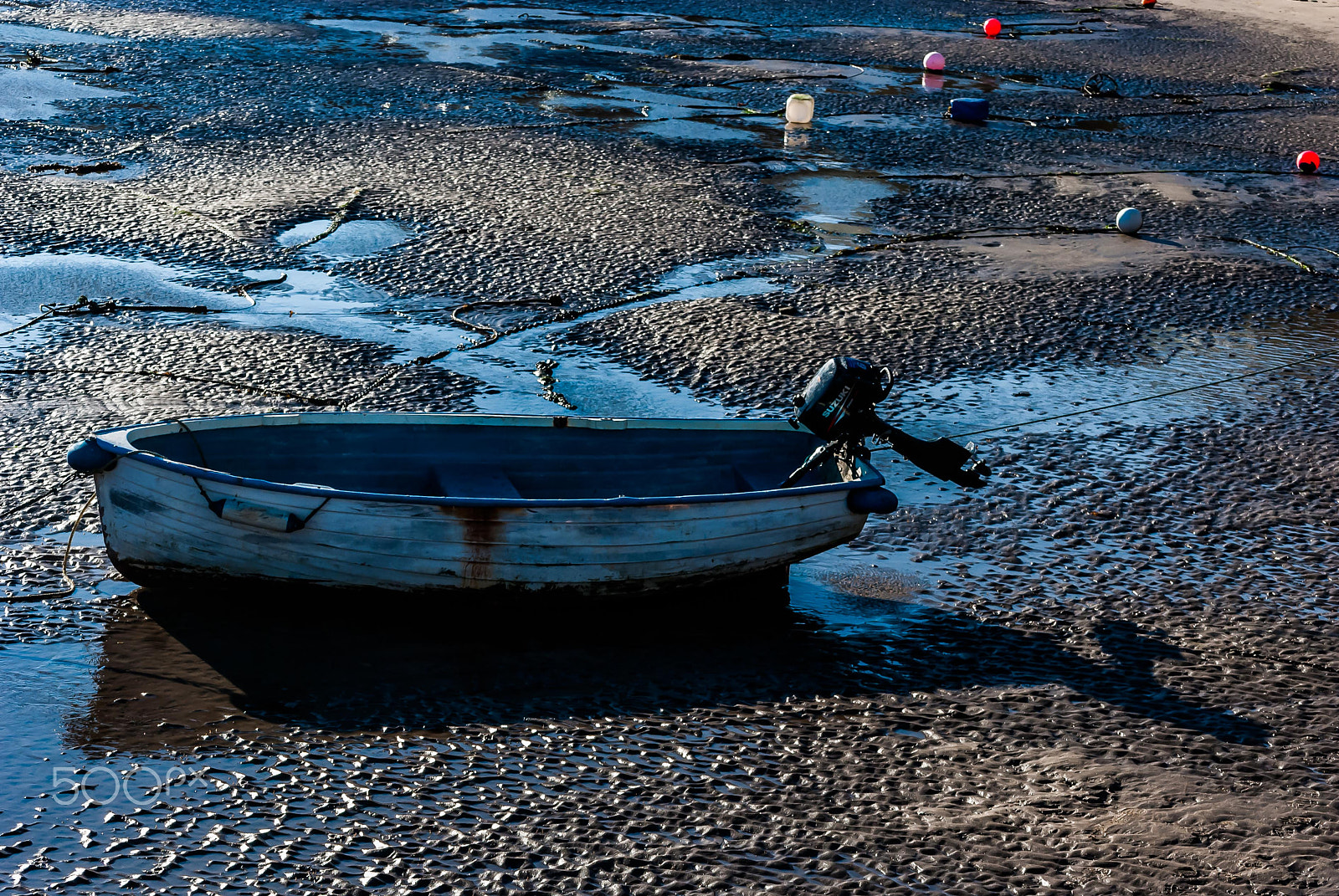 Nikon D40X sample photo. Small boat at low tide photography