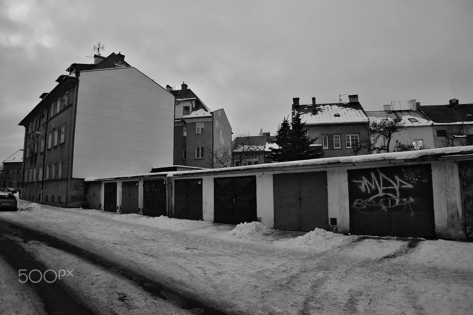 Nikon Coolpix P6000 sample photo. Chomutov, czech republic - january 20, 2017: garages and houses in roosevelt street in snowy winter photography
