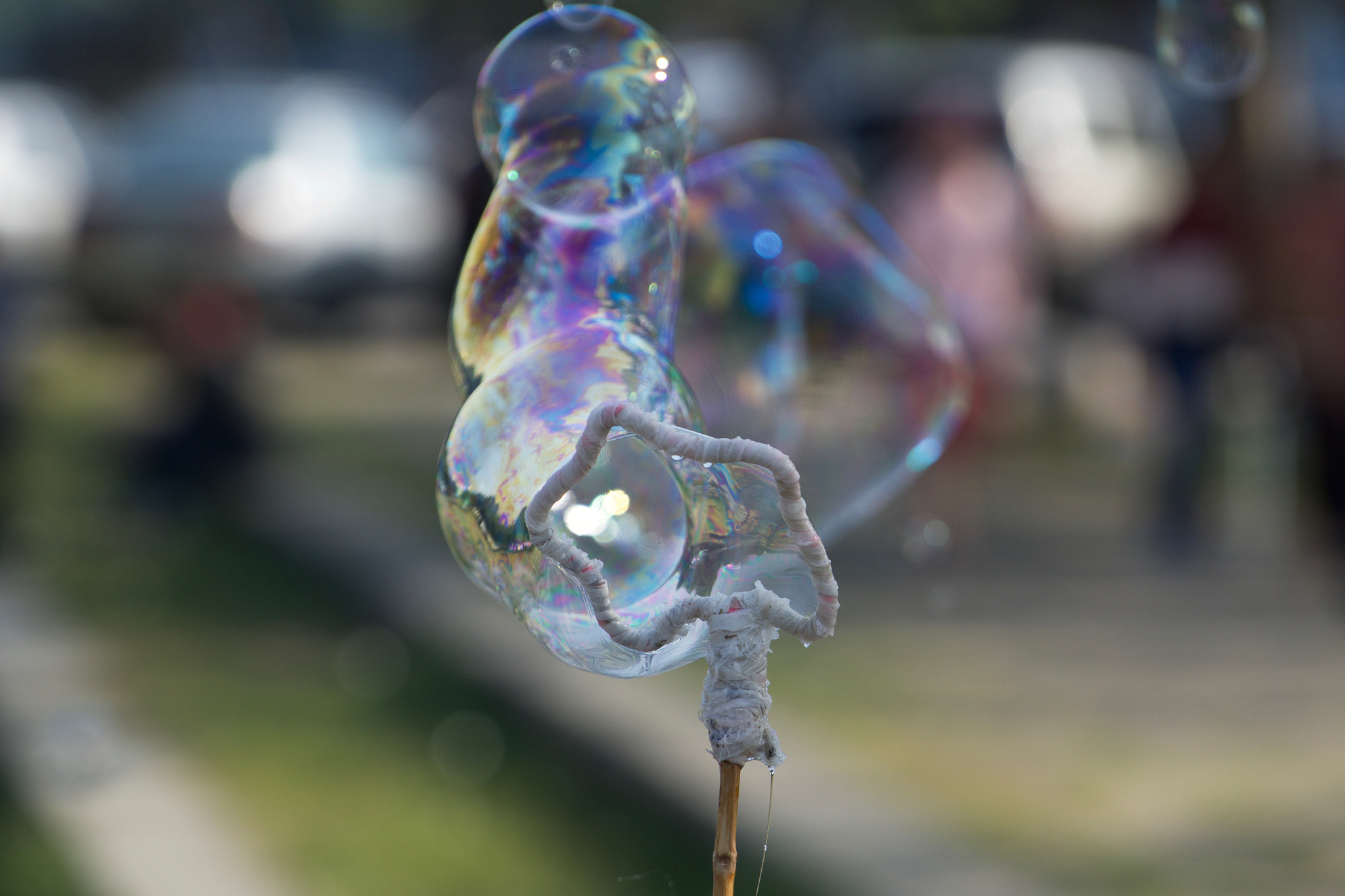 Sony a6000 + Sony FE 70-200mm F4 G OSS sample photo. Bubbles in the park photography