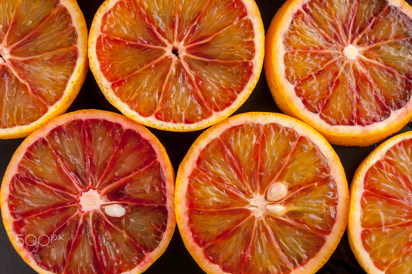 Canon EOS 500D (EOS Rebel T1i / EOS Kiss X3) sample photo. Red sicilian oranges sliced photography