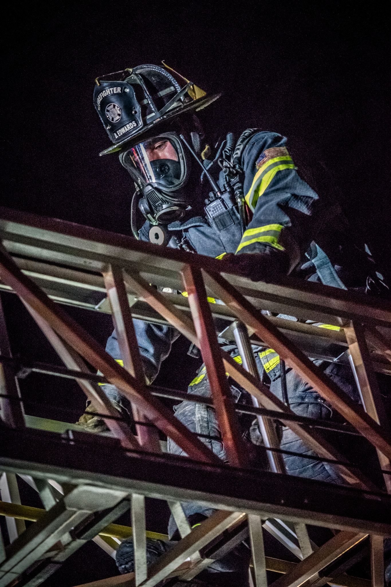 Sigma 70-200mm F2.8 EX DG Macro HSM II sample photo. Firefighter decending ladder photography