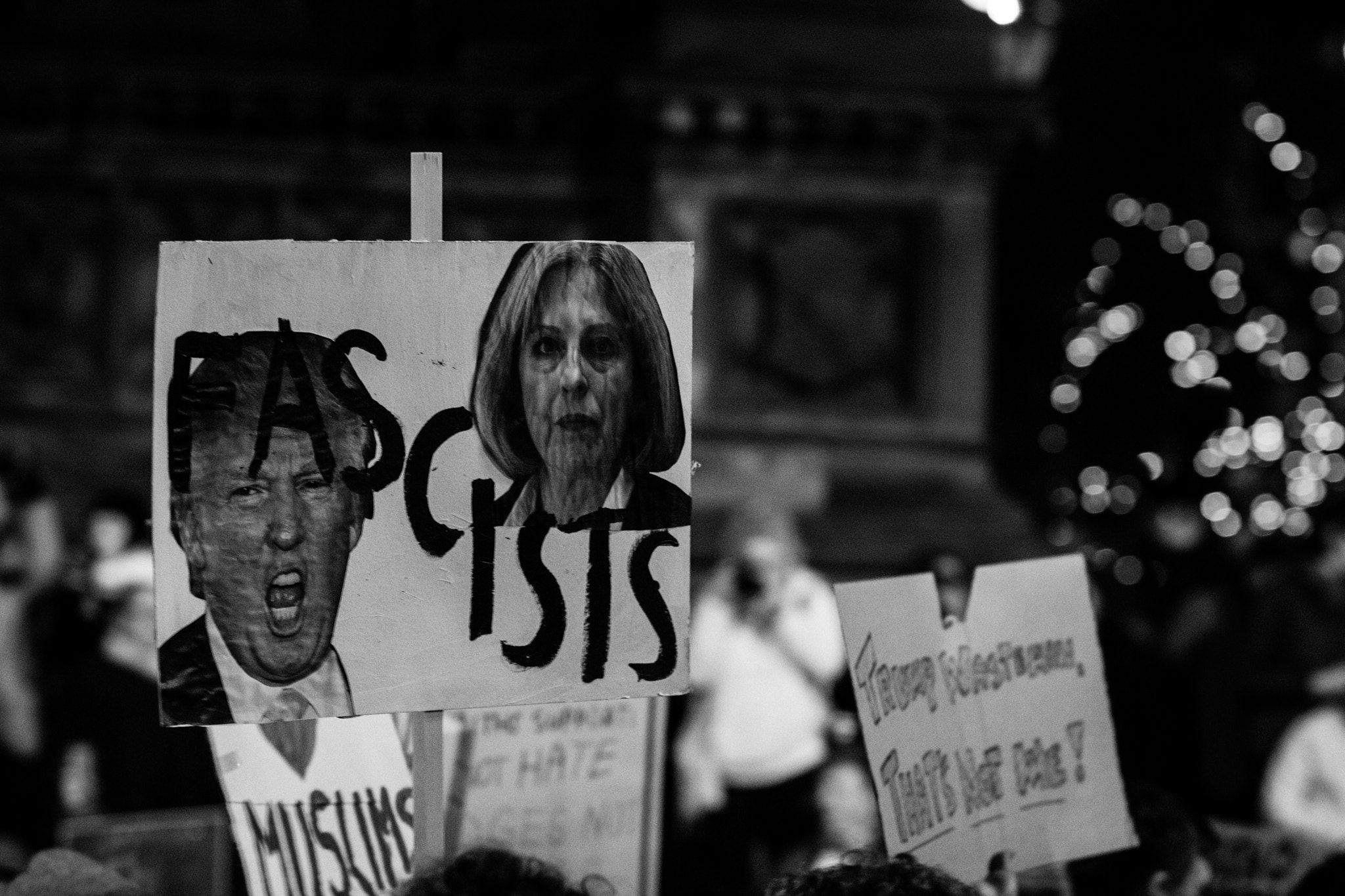 Canon EOS 650D (EOS Rebel T4i / EOS Kiss X6i) + Canon EF 85mm F1.8 USM sample photo. Pro-refugee, anti- trump manchester demo photography