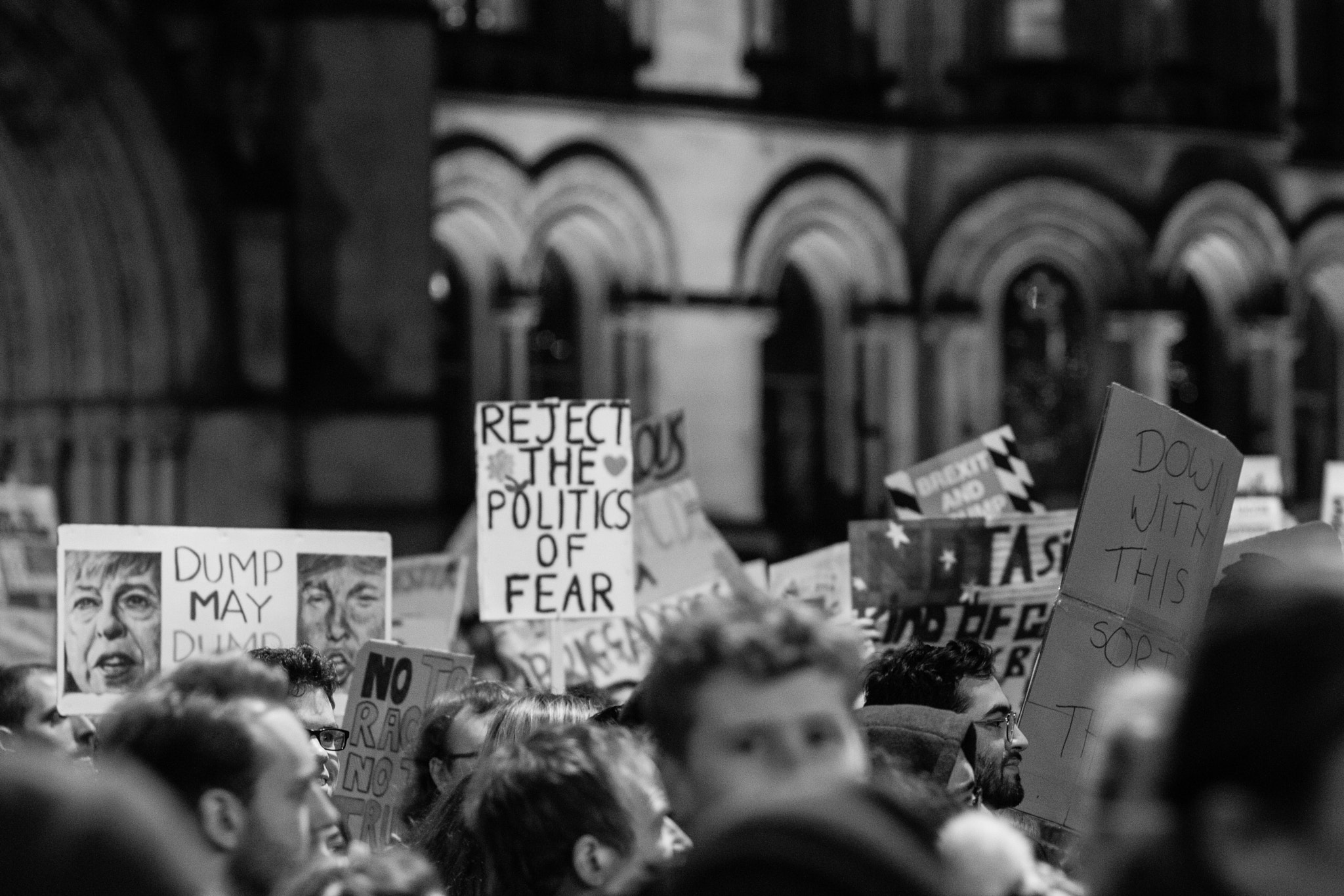 Canon EOS 650D (EOS Rebel T4i / EOS Kiss X6i) + Canon EF 85mm F1.8 USM sample photo. Pro-refugee, anti- trump manchester demo photography