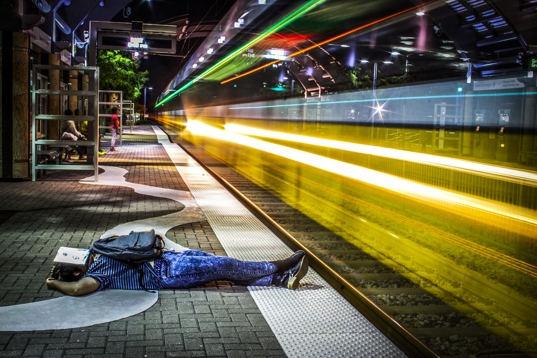 Canon EF-S 18-55mm F3.5-5.6 II sample photo. Midnight train photography