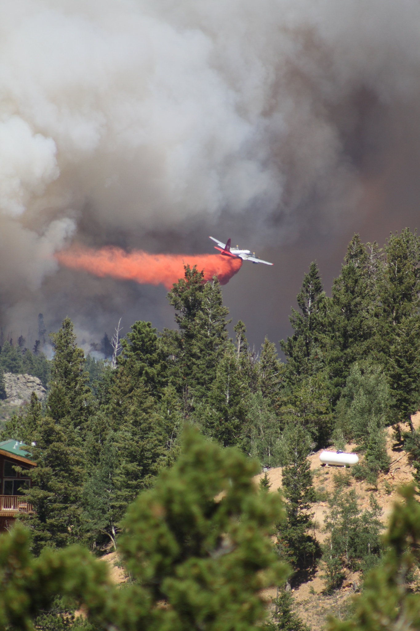 Canon EOS 500D (EOS Rebel T1i / EOS Kiss X3) + EF75-300mm f/4-5.6 sample photo. Fighting the cold springs fire, nederland, co photography