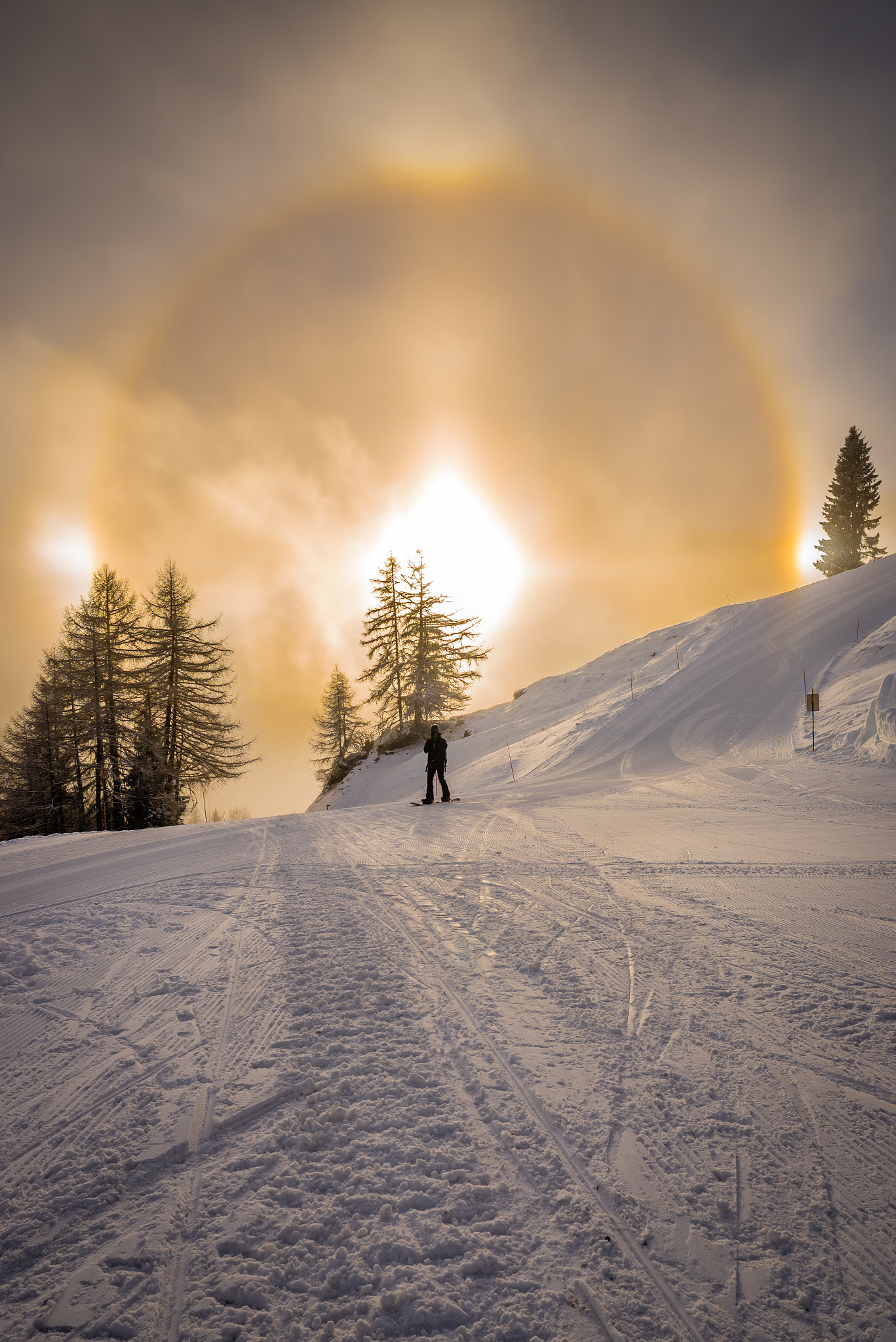 Nikon D610 + AF Nikkor 20mm f/2.8 sample photo. Sun dog on the ski slopes photography