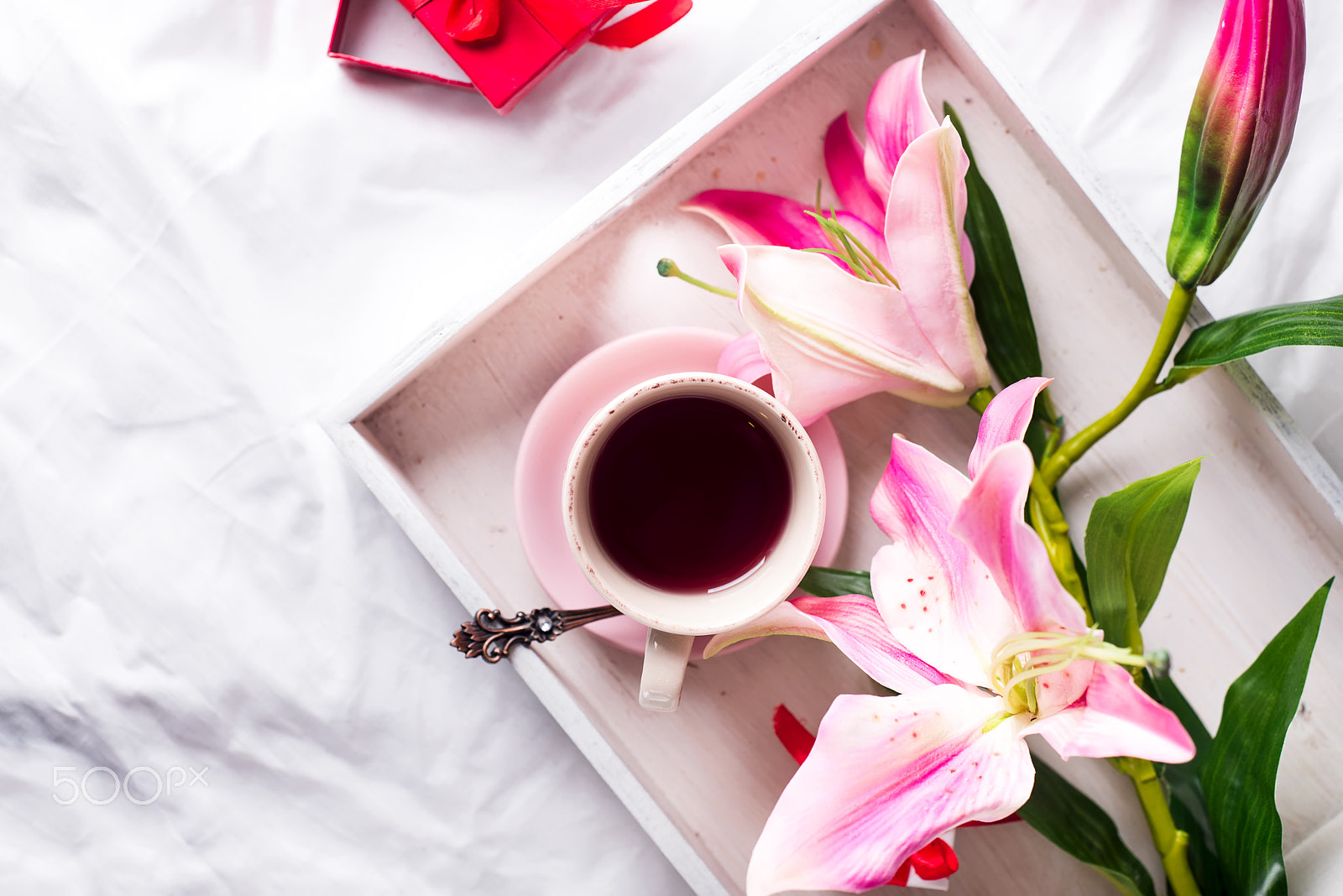 Nikon D610 + AF Nikkor 50mm f/1.8 sample photo. Tray with cup of hot tea in the bed, photography