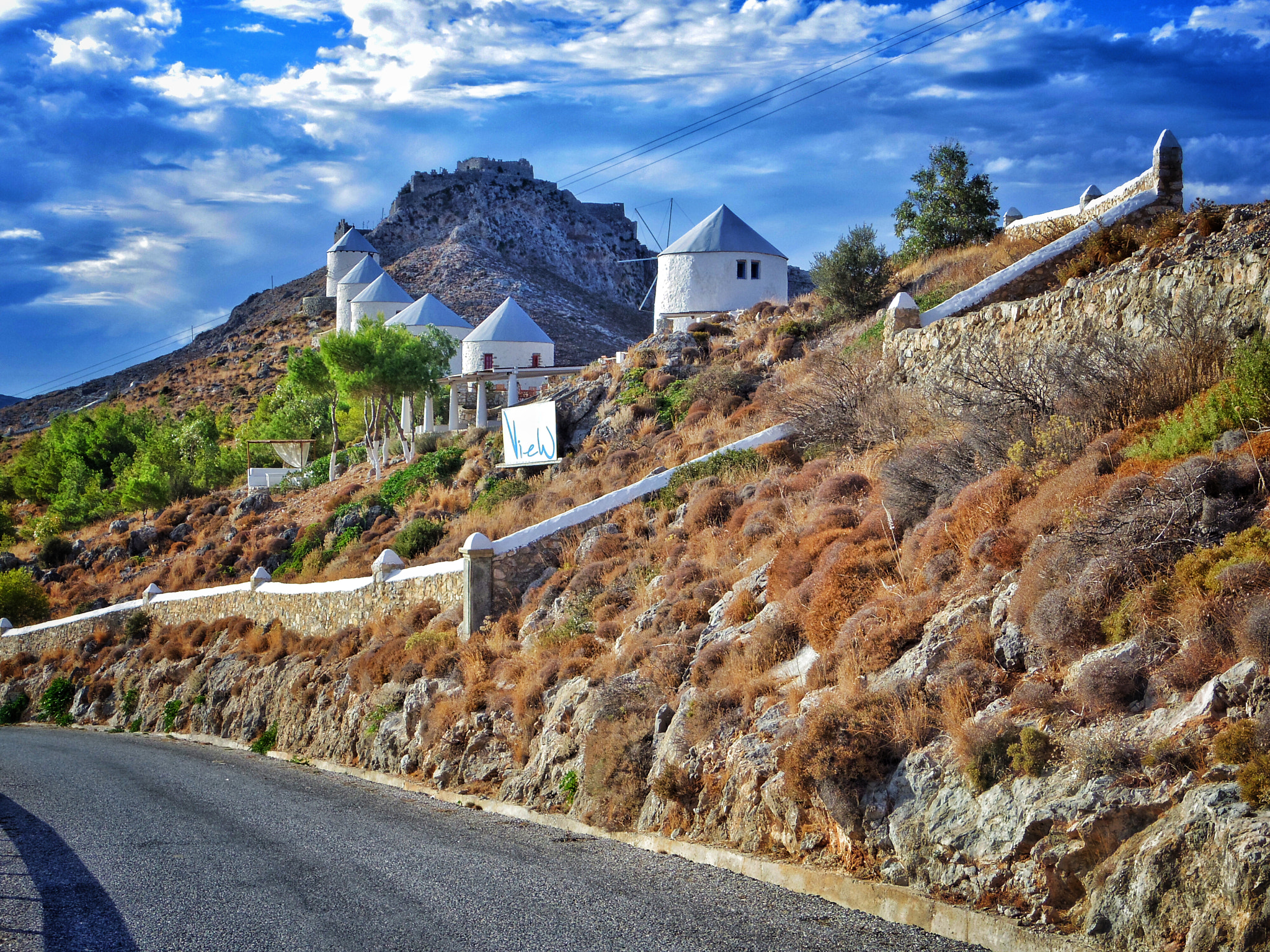 Pentax 02 Standard Zoom sample photo. The old windmills on leros photography