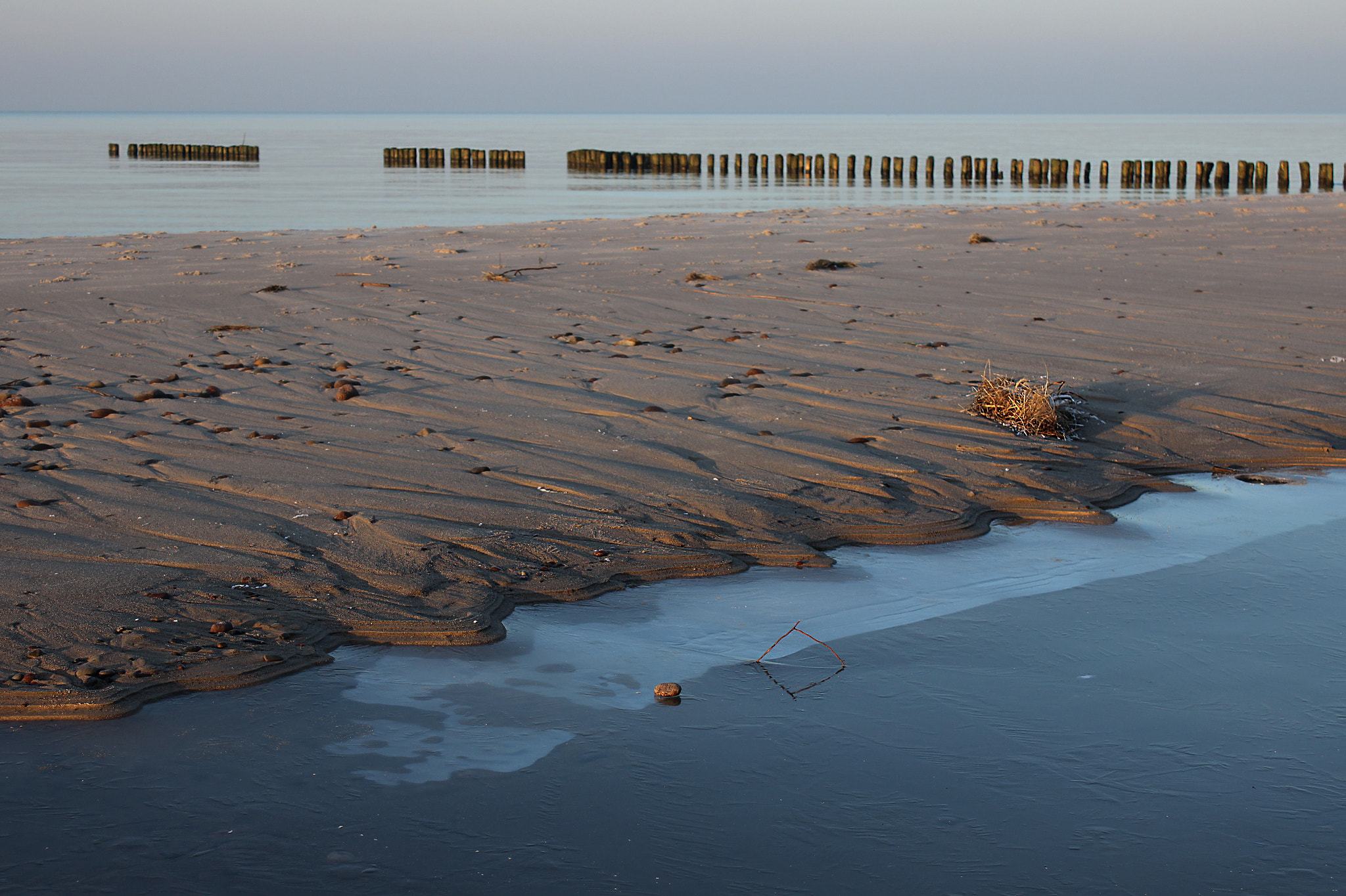 Canon EF-S 18-55mm F3.5-5.6 IS sample photo. Ice sand and sea photography