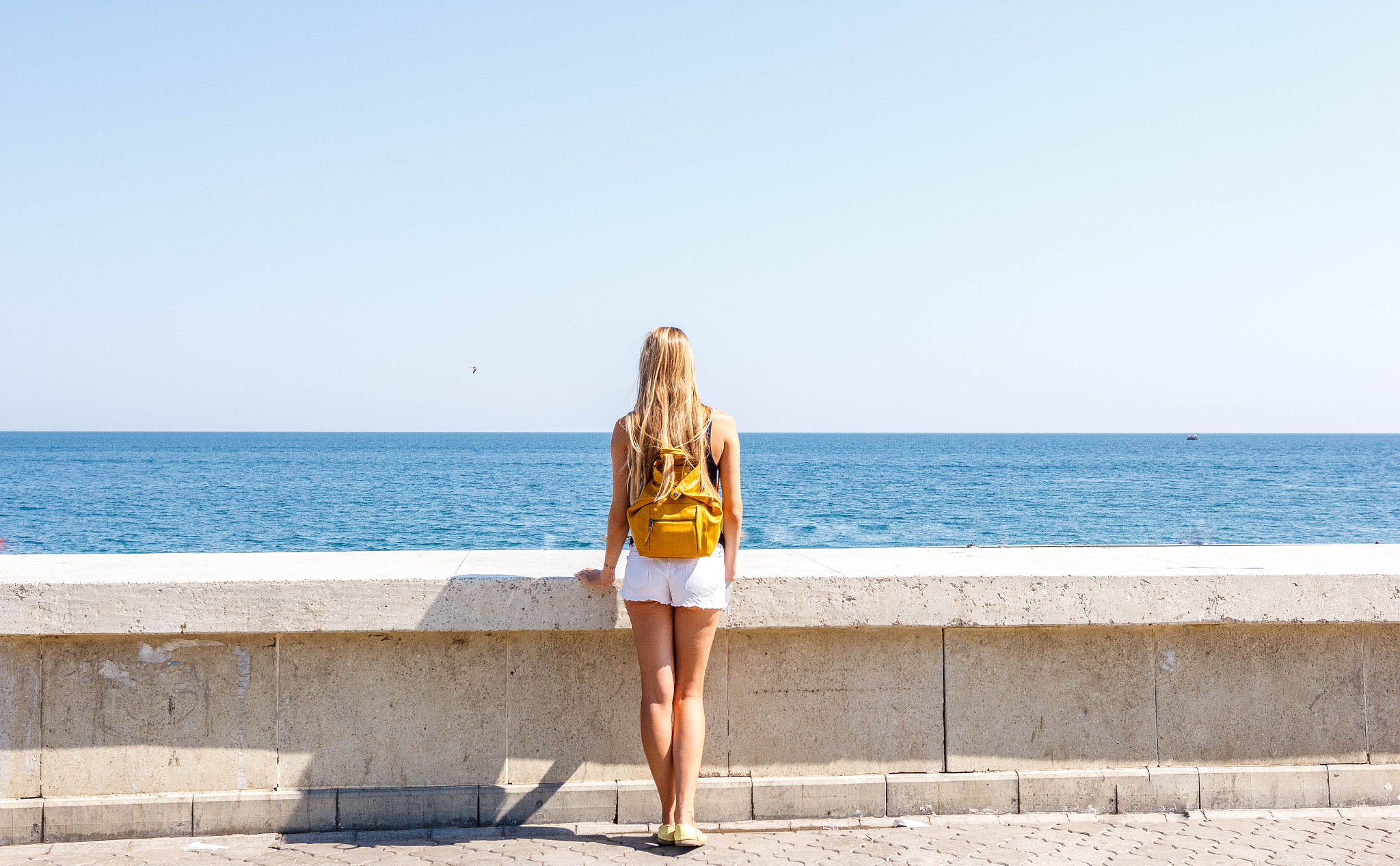 Canon EOS 60D + Sigma 18-35mm f/1.8 DC HSM sample photo. Beautiful girl near the sea photography