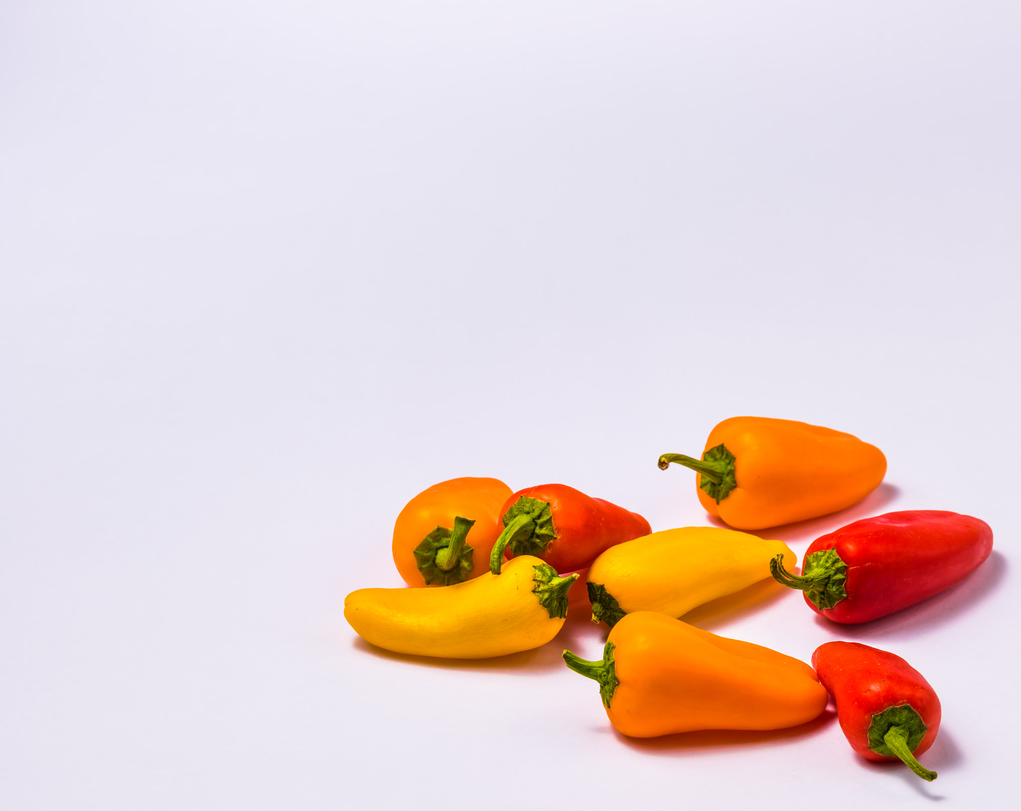 Sigma 105mm F2.8 EX DG OS HSM sample photo. Negative space sweet peppers photography