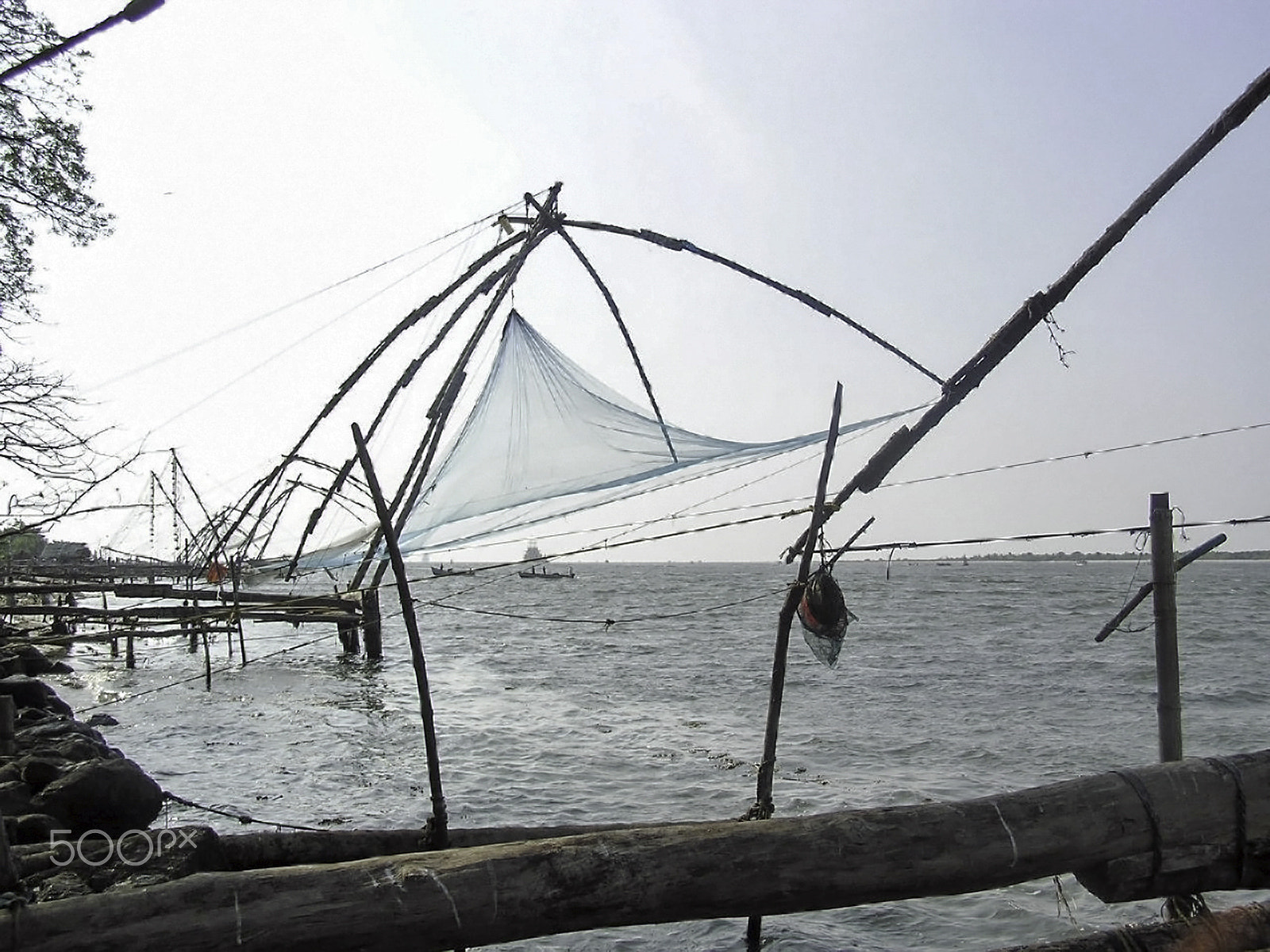 Olympus C750UZ sample photo. Fishing nets on the sea coast in alleppey, kerala, india photography