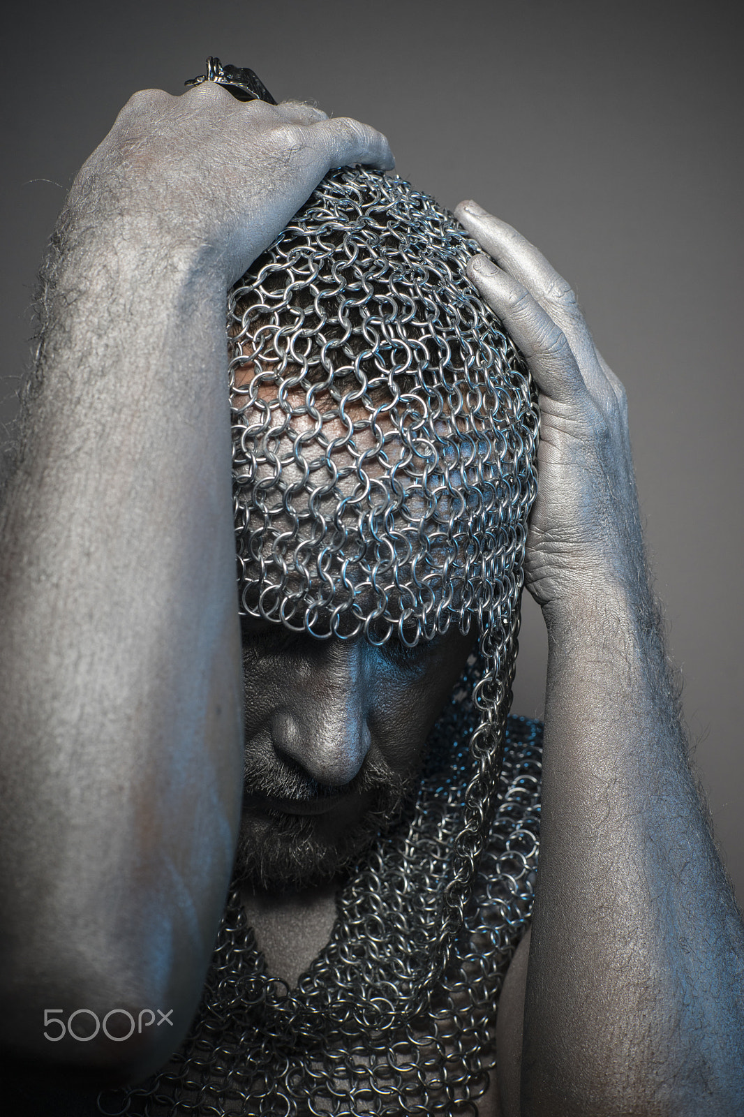 Sony a7 + Sony DT 50mm F1.8 SAM sample photo. Conflict, man in chain mail and leather painted silver, medieval photography