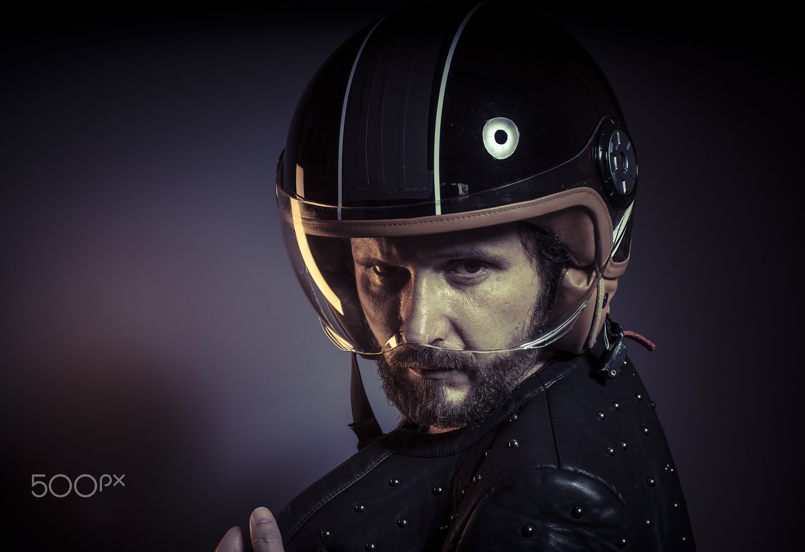 Sony a7 + Sony DT 50mm F1.8 SAM sample photo. Biker with motorcycle helmet and black leather jacket, metal stu photography