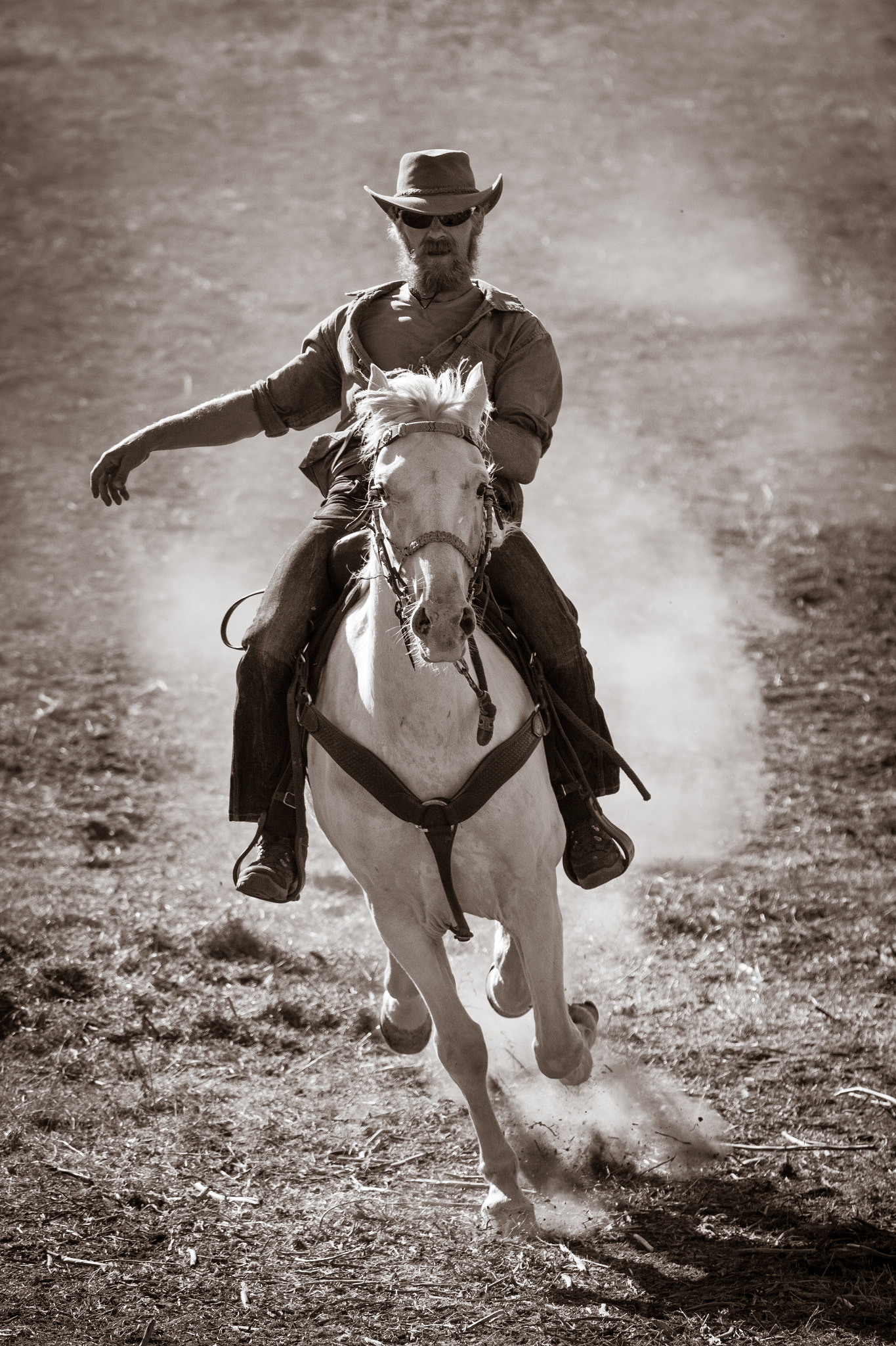 Canon EOS 50D + Canon EF 70-200mm F4L IS USM sample photo. Cowboy photography