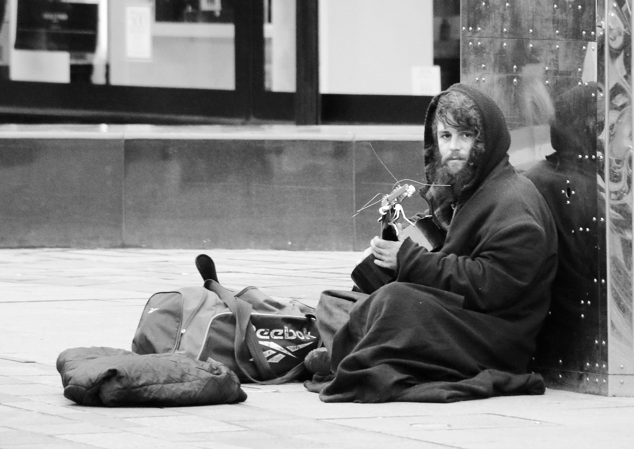 Canon EF-S 55-250mm F4-5.6 IS STM sample photo. Cold day busker photography