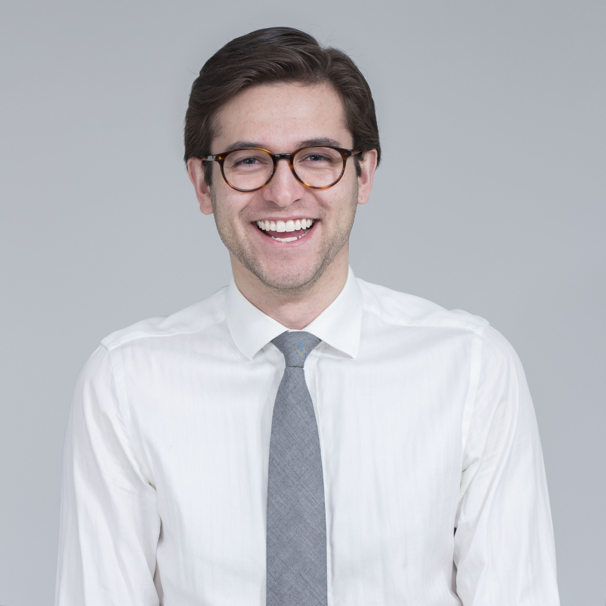 Canon EF 50mm F1.4 USM sample photo. Portrait of man in white shirt and glasses photography