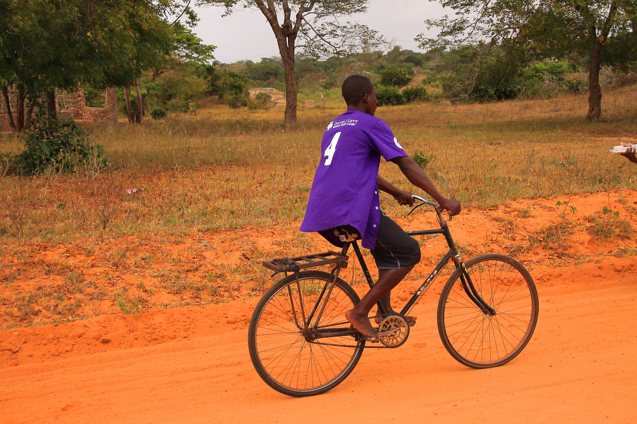 Canon EOS 50D + Sigma 18-125mm F3.8-5.6 DC OS HSM sample photo. Kenia bicycle photography