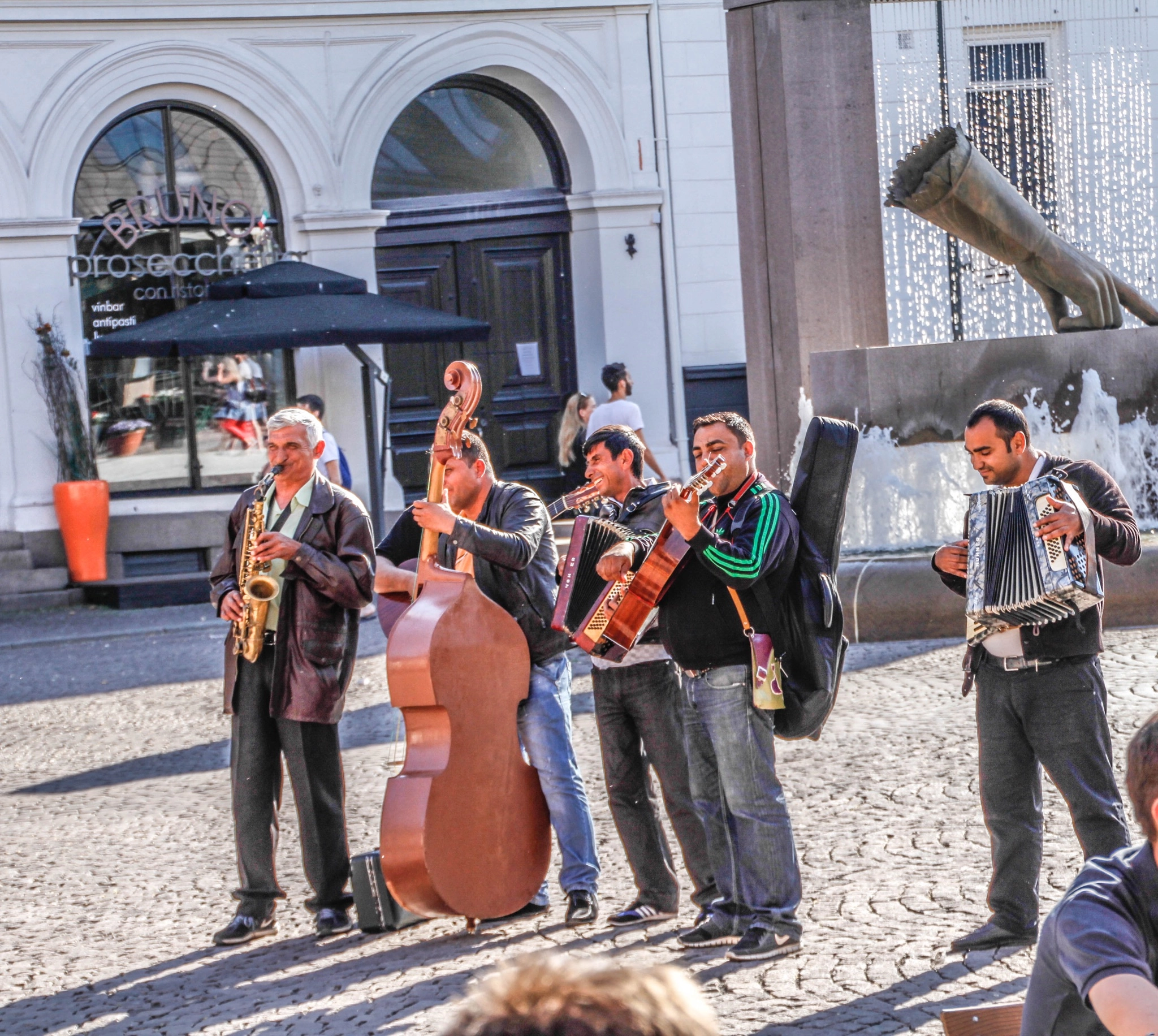 Canon EOS 7D + Tamron 18-270mm F3.5-6.3 Di II VC PZD sample photo. Taken in norway! this street musicians made e great mode. photography