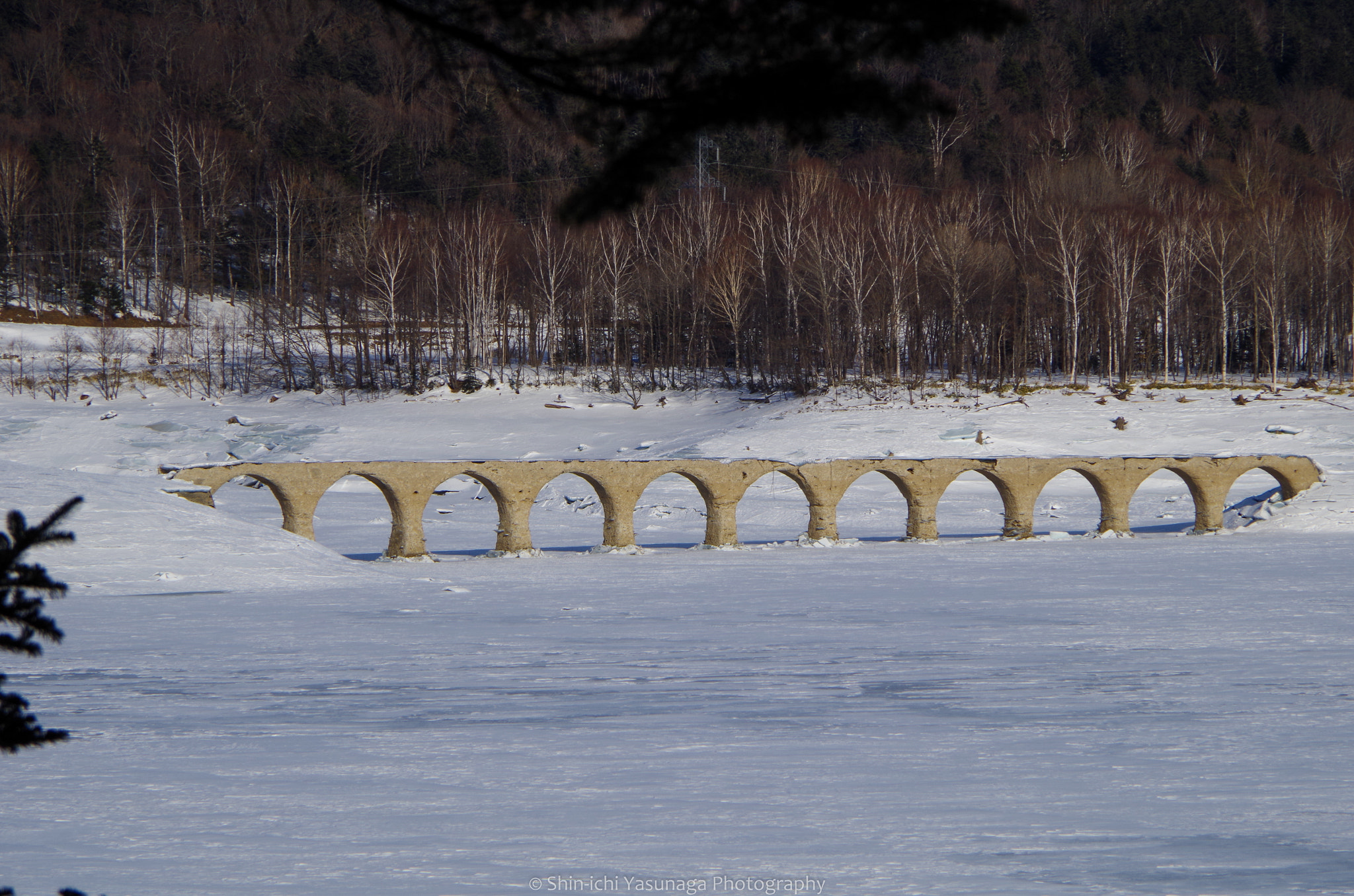 Pentax K-30 sample photo. Taushubetsu railroad bridge on lake nukabira hokkaido,japan. photography