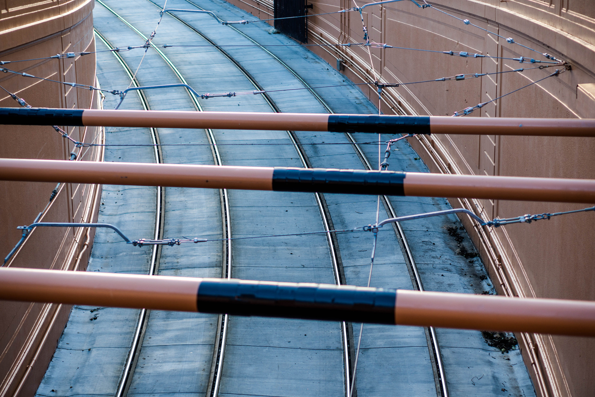 E 50mm F1.8 OSS sample photo. Muni rails photography