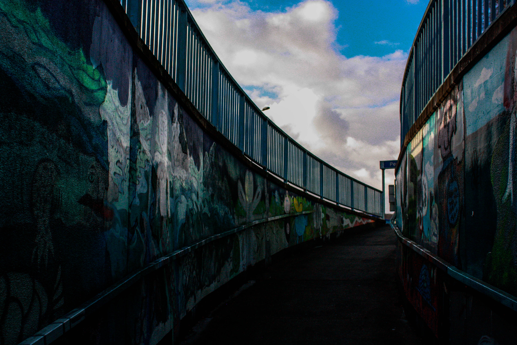 Canon EOS 450D (EOS Rebel XSi / EOS Kiss X2) + Canon EF 28mm F1.8 USM sample photo. Graffiti under bridge photography