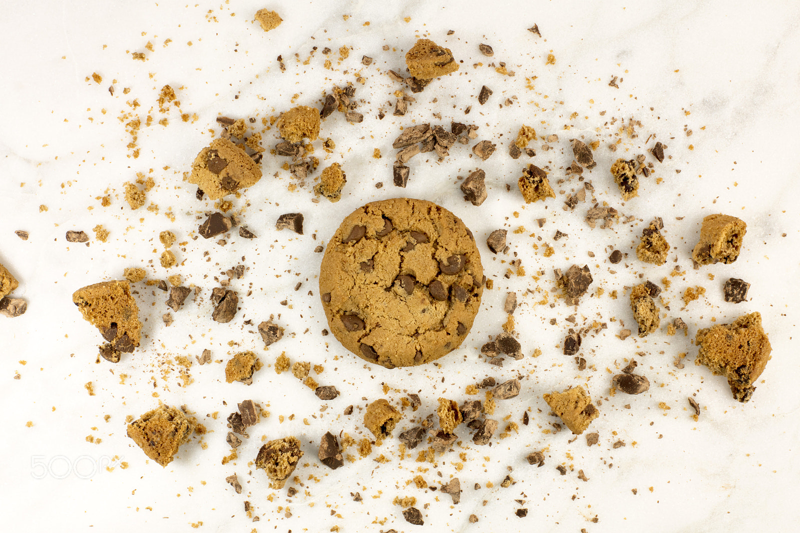Canon EOS 5DS R sample photo. Chocolate chips cookie with crumbs on white marble photography