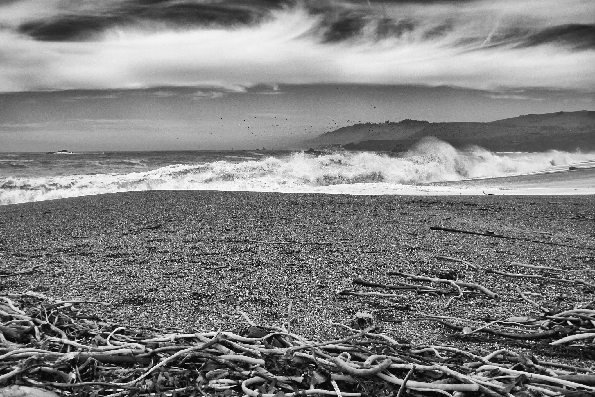 Canon EOS 500D (EOS Rebel T1i / EOS Kiss X3) sample photo. Clouds waves sand photography