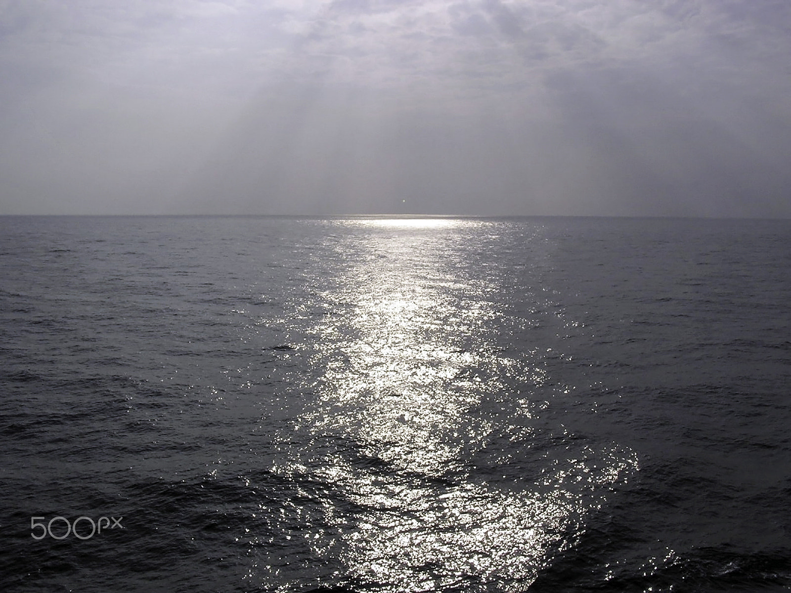 Olympus C750UZ sample photo. Rays of light shimering over the waters of the arabian sea in th photography