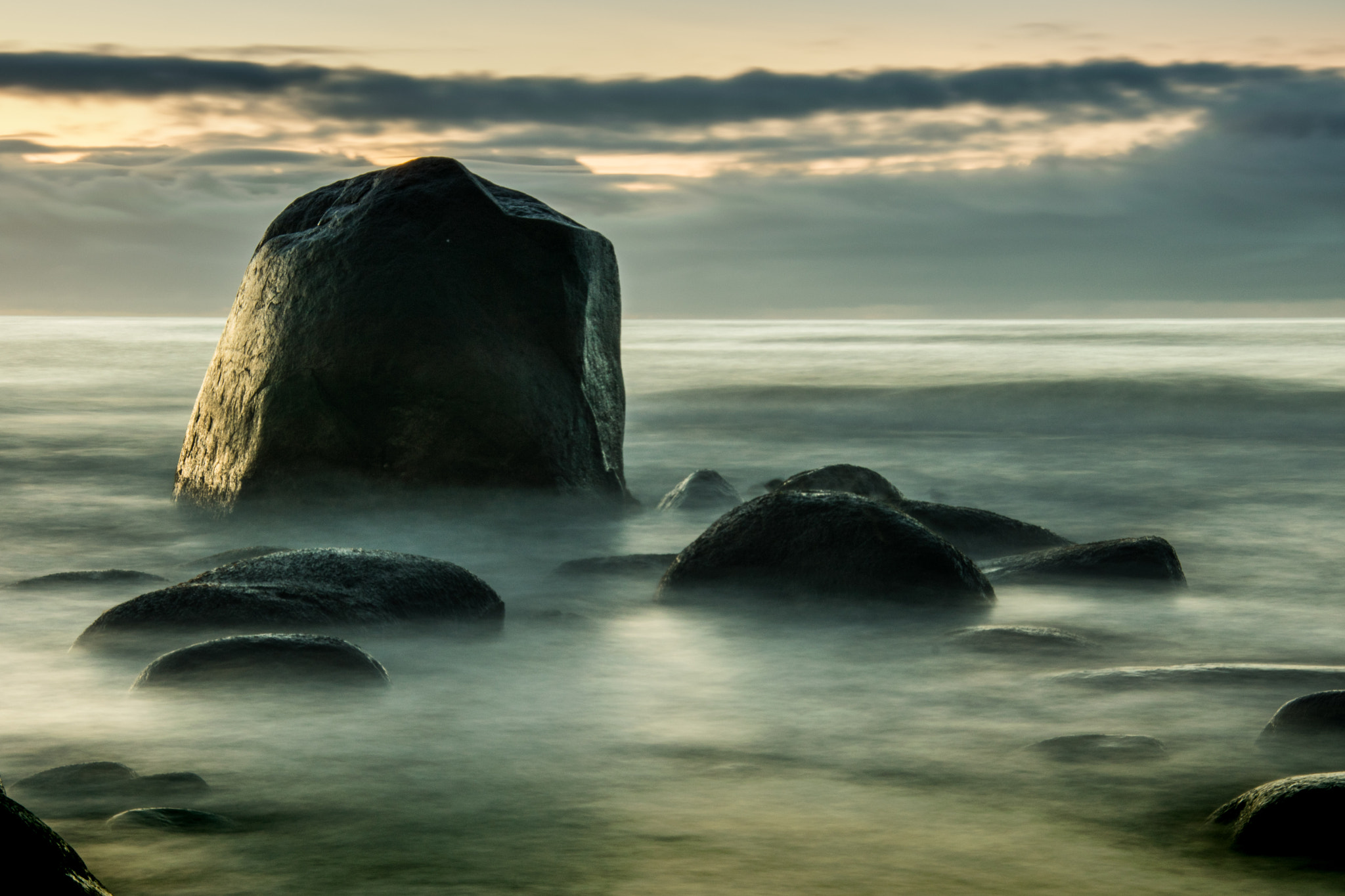 Sigma 18-200mm F3.5-6.3 DC OS HSM sample photo. Rocks in water photography