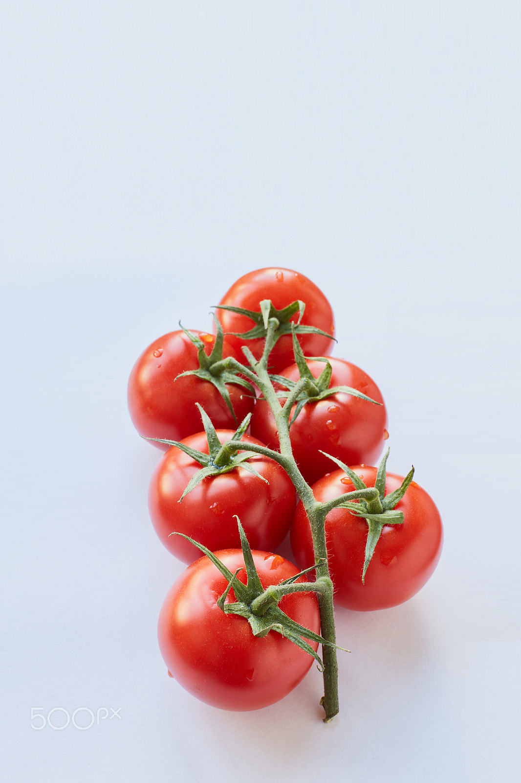 Canon EF 50mm F1.2L USM sample photo. Fresh cherry tomatoes on white background photography