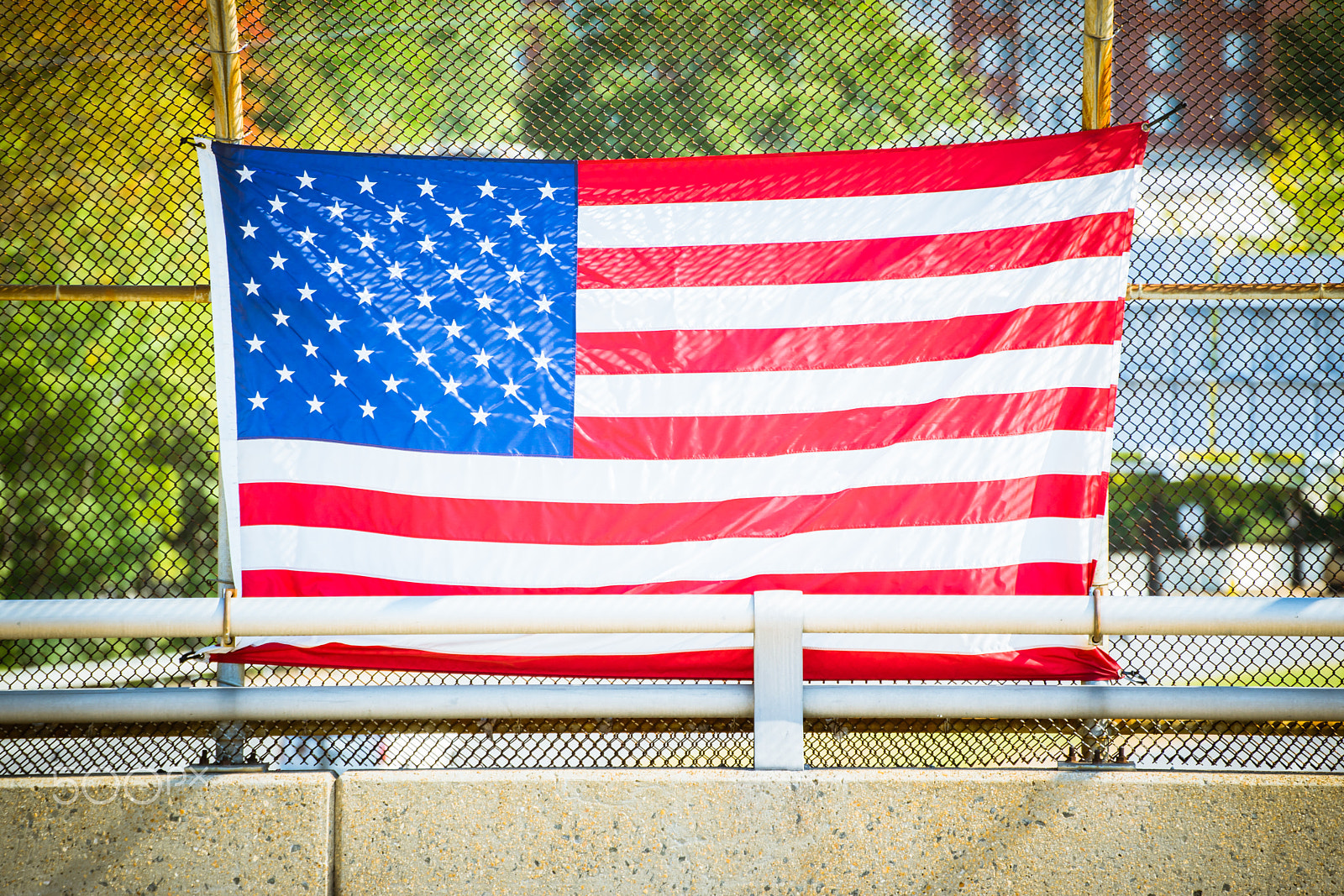Sony a7 II + Tamron SP 70-300mm F4-5.6 Di USD sample photo. American flag on fence photography