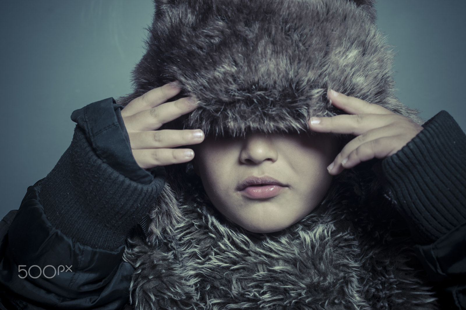 Sony a7 + Sony DT 50mm F1.8 SAM sample photo. Infant child with fur hat and winter coat, cold concept and stor photography