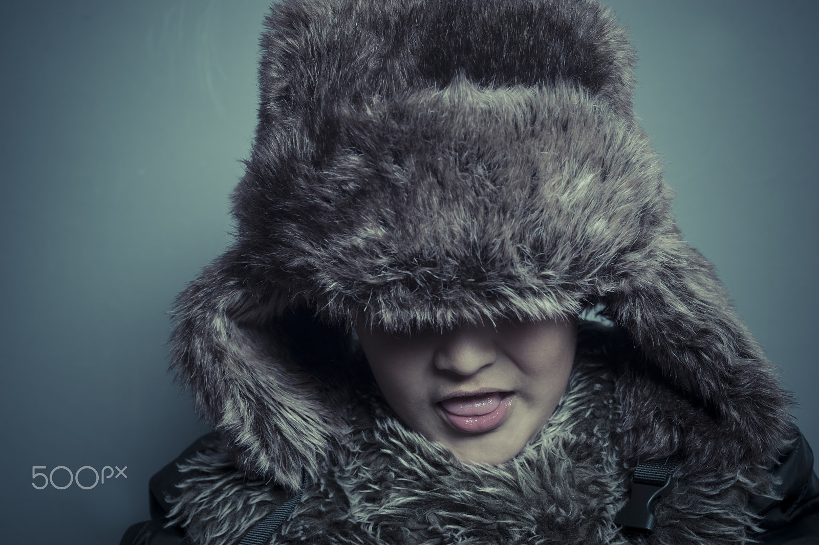 Sony a7 + Sony DT 50mm F1.8 SAM sample photo. Funny child with fur hat and winter coat, cold concept and storm photography