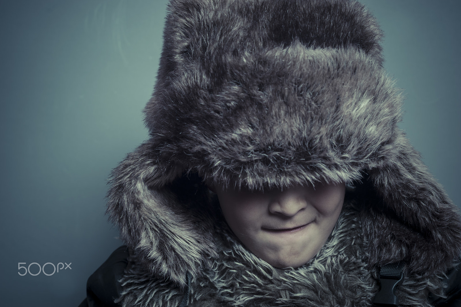 Sony a7 + Sony DT 50mm F1.8 SAM sample photo. Funny child with fur hat and winter coat, cold concept and storm photography