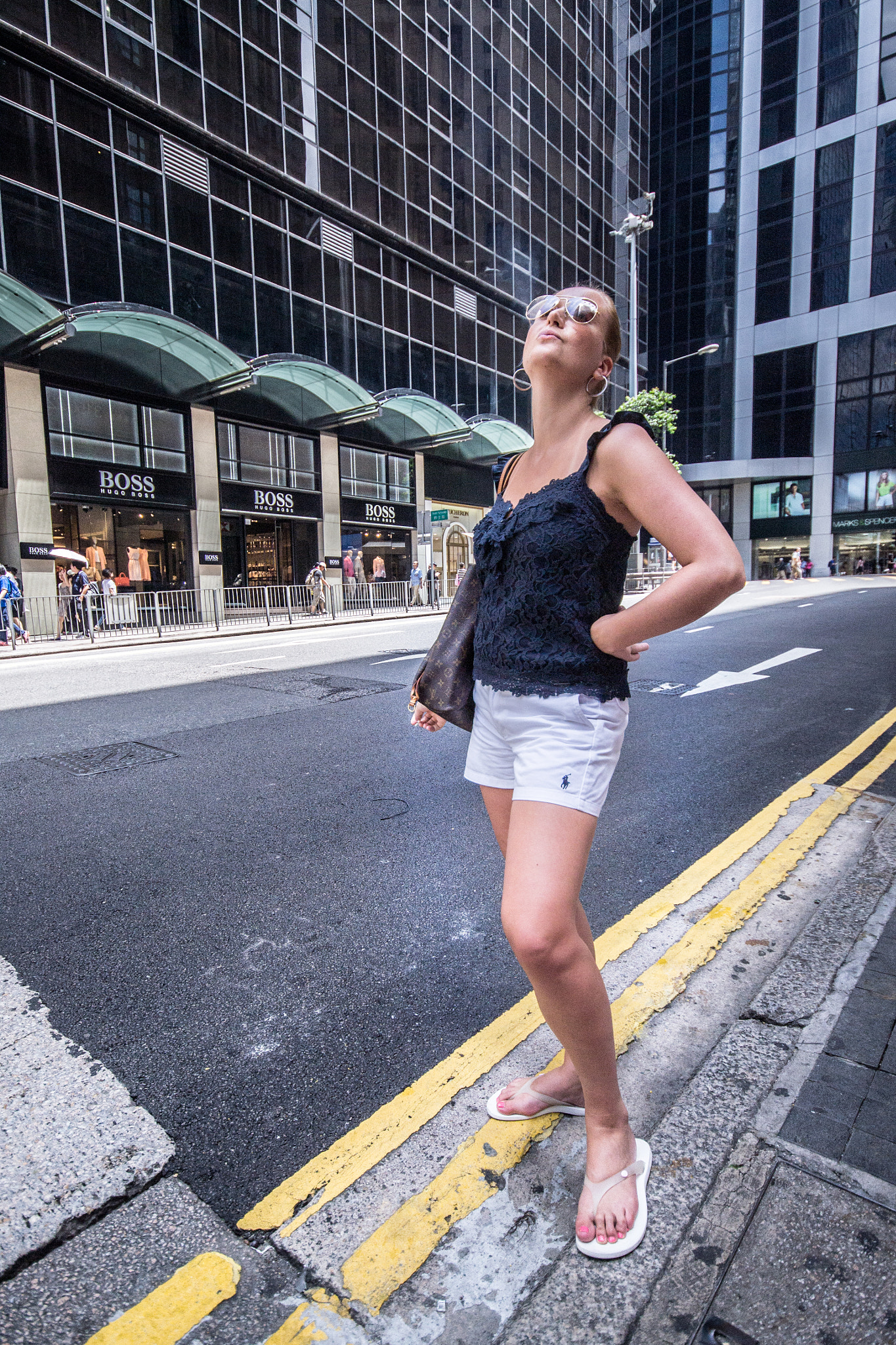 Sigma 10-20mm F4-5.6 EX DC HSM sample photo. Woman in the streets of central hong kong photography