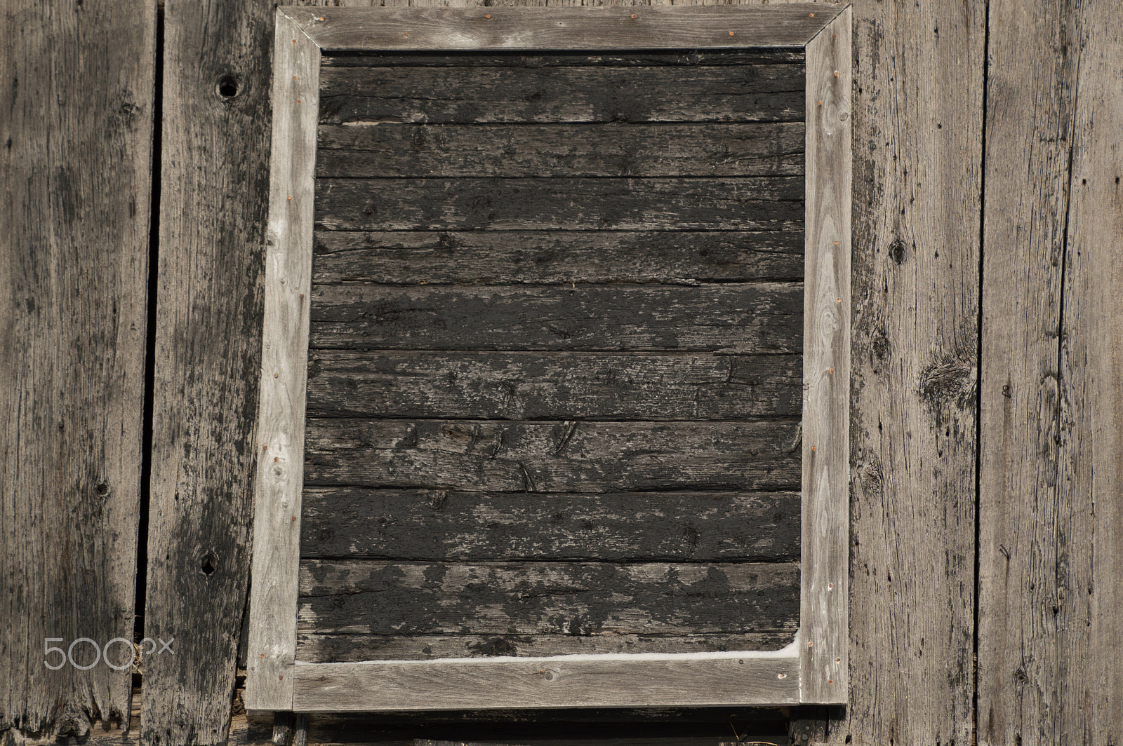 Nikon D3200 sample photo. Framed old black door in the wall of an old farm building photography